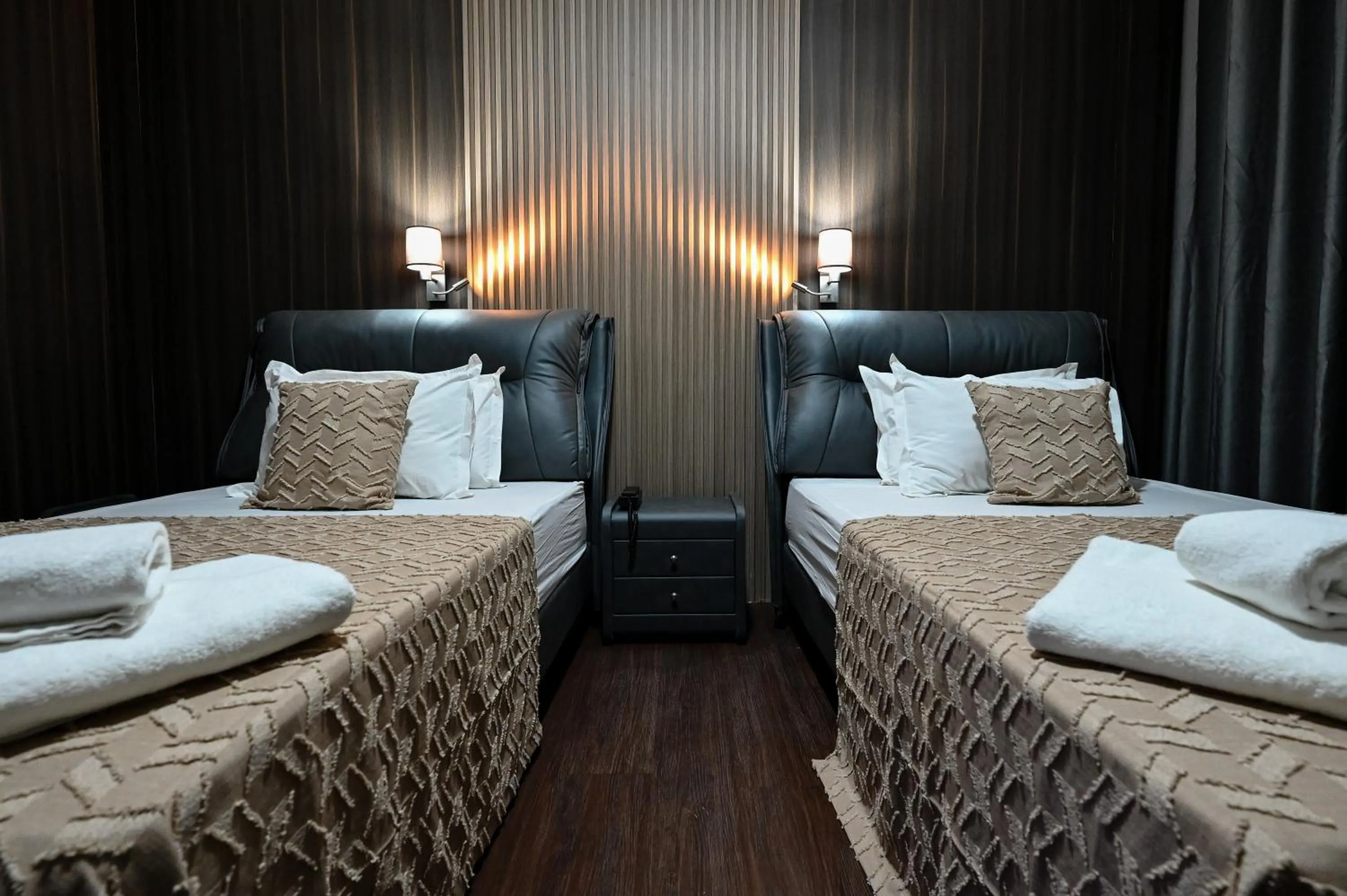 Bed in Grey Star Hotel