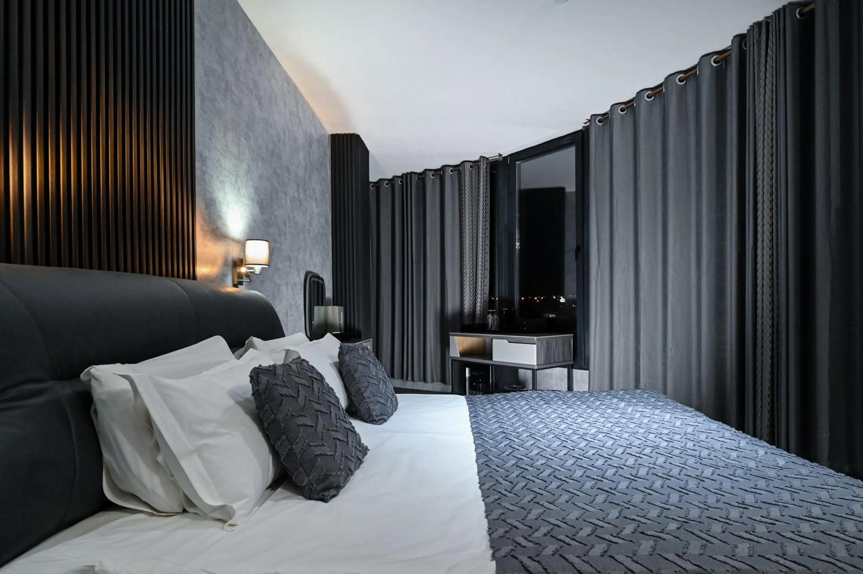 Bed in Grey Star Hotel