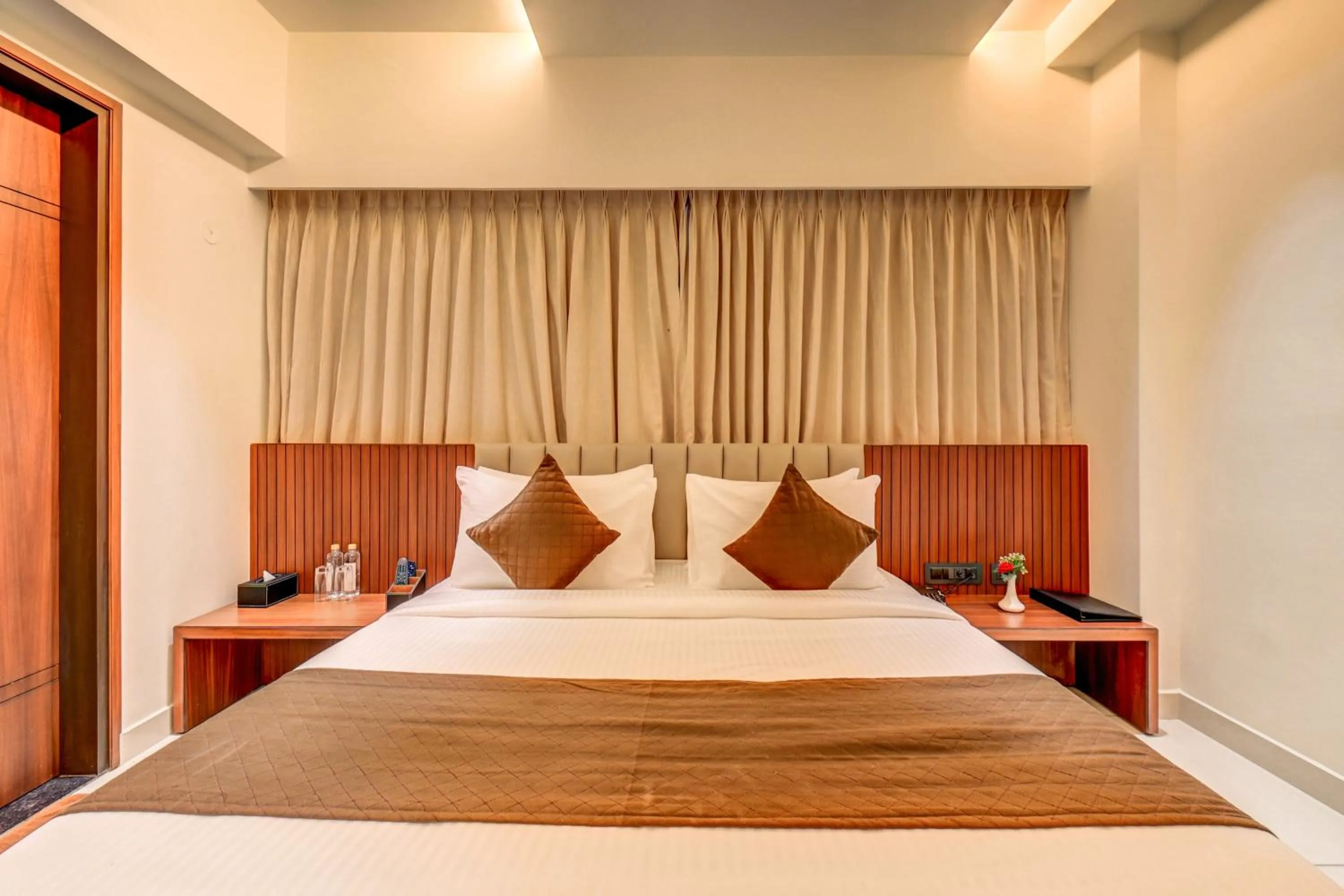 Bed in Hotel Hari Govindas Mysore - Explore the Heart of Mysore