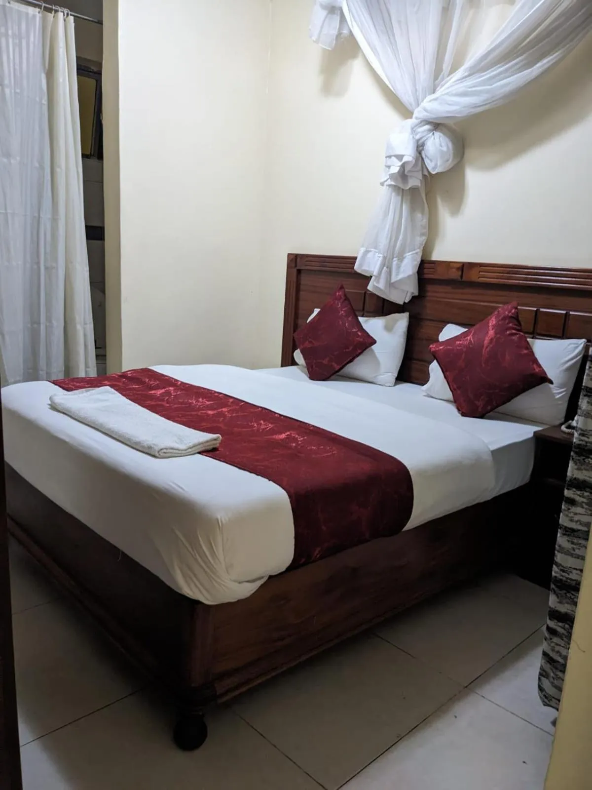 Bed in Epitome Times Hotel