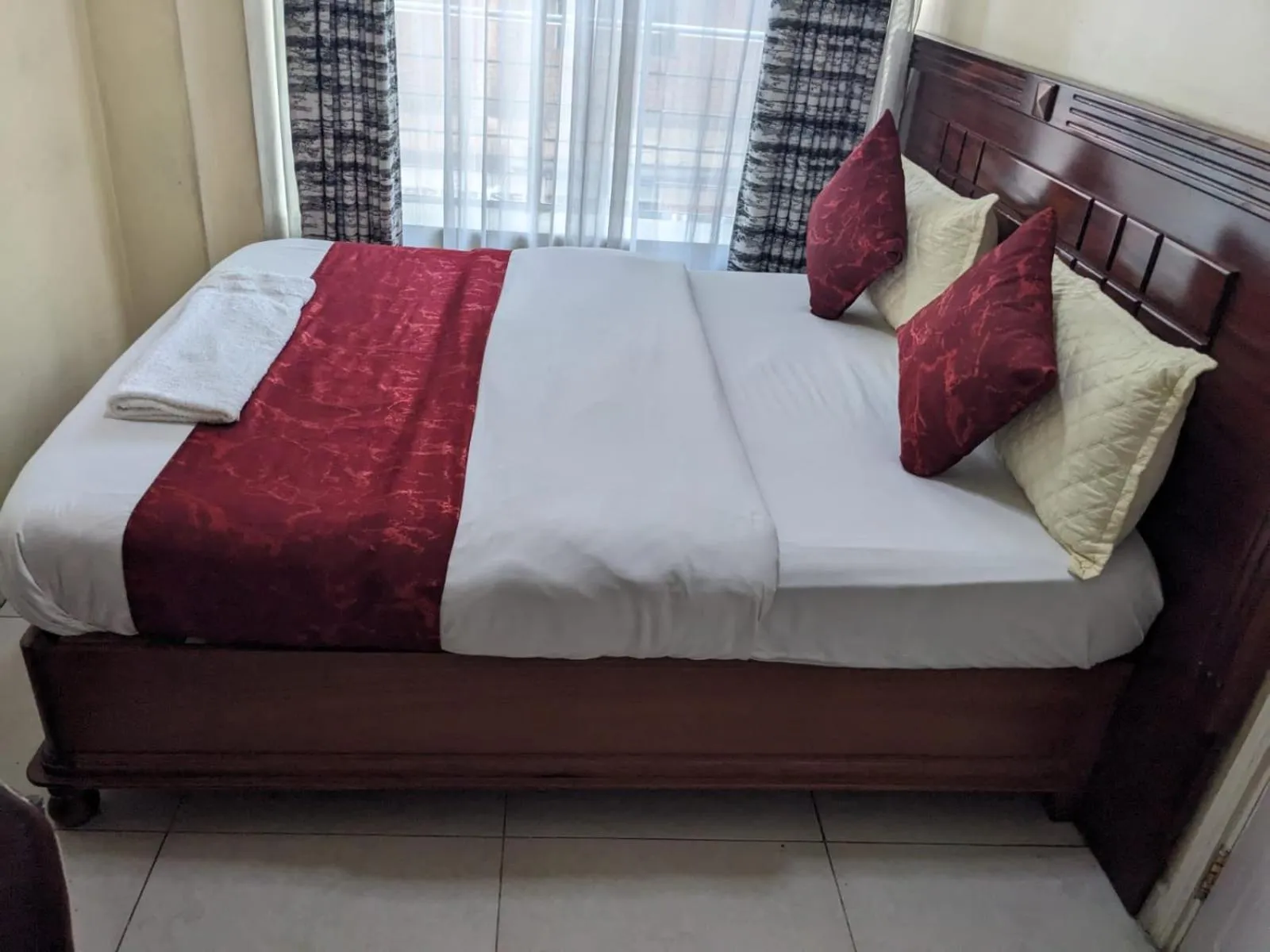 Bed in Epitome Times Hotel