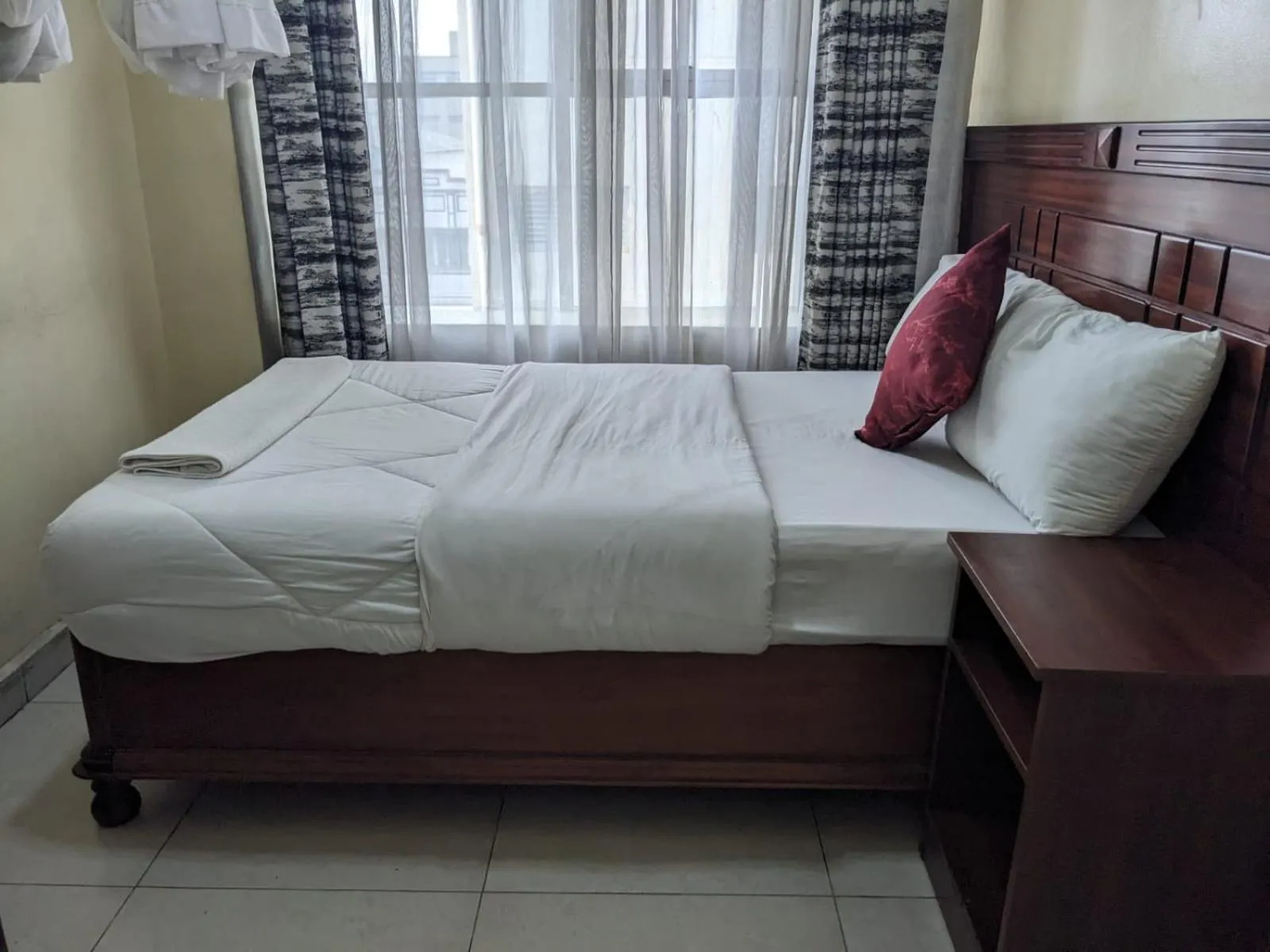 Bed in Epitome Times Hotel