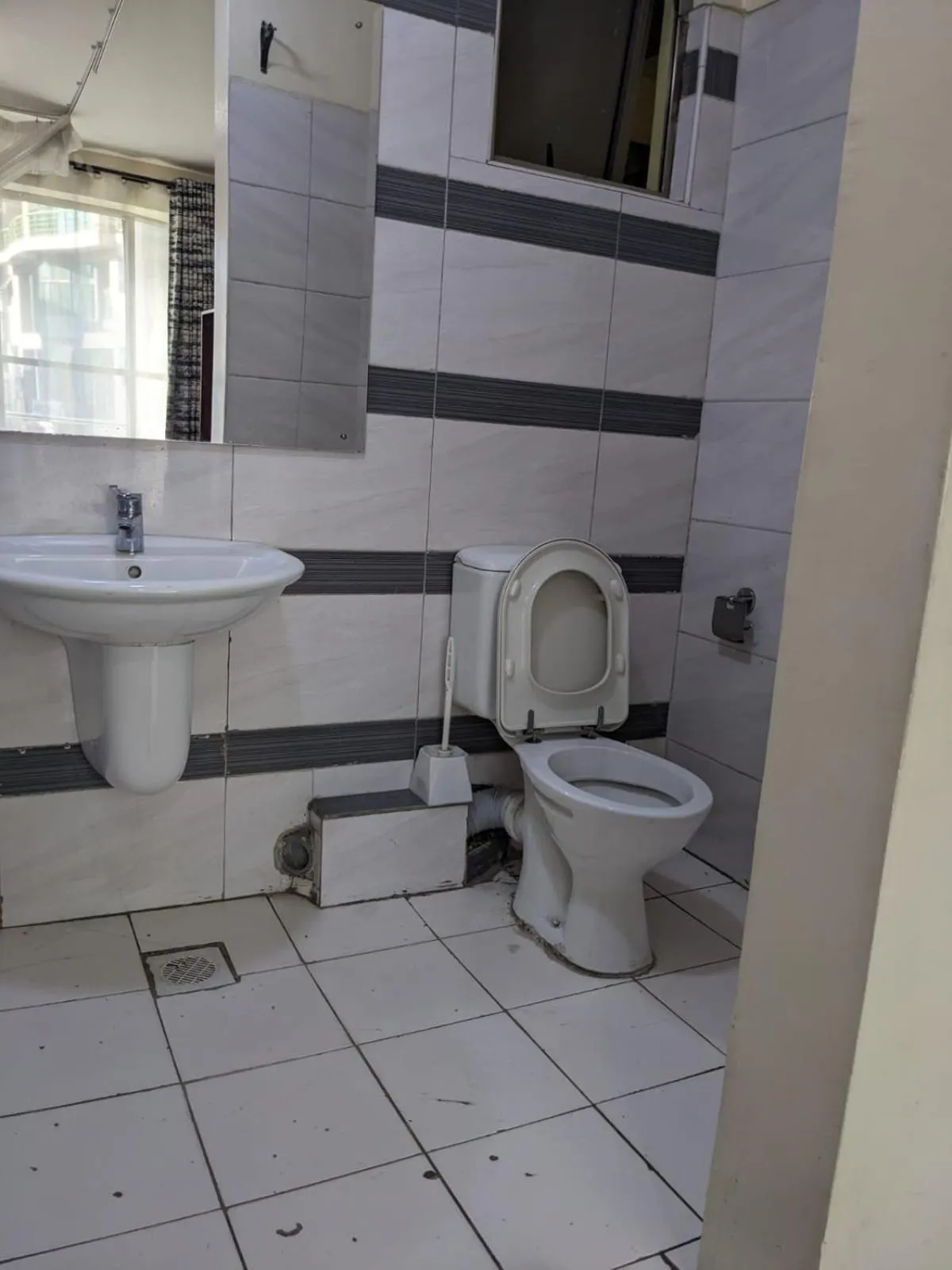 Bathroom in Epitome Times Hotel