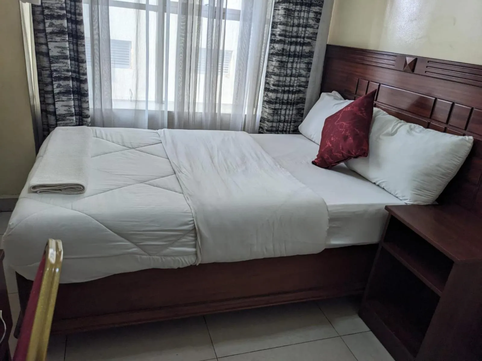 Bed in Epitome Times Hotel