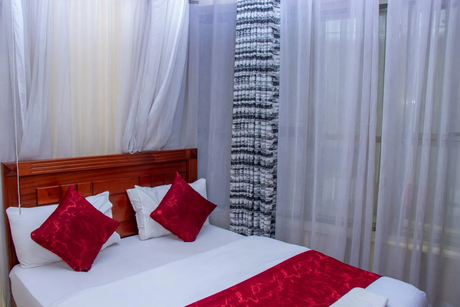 Bed in Epitome Times Hotel