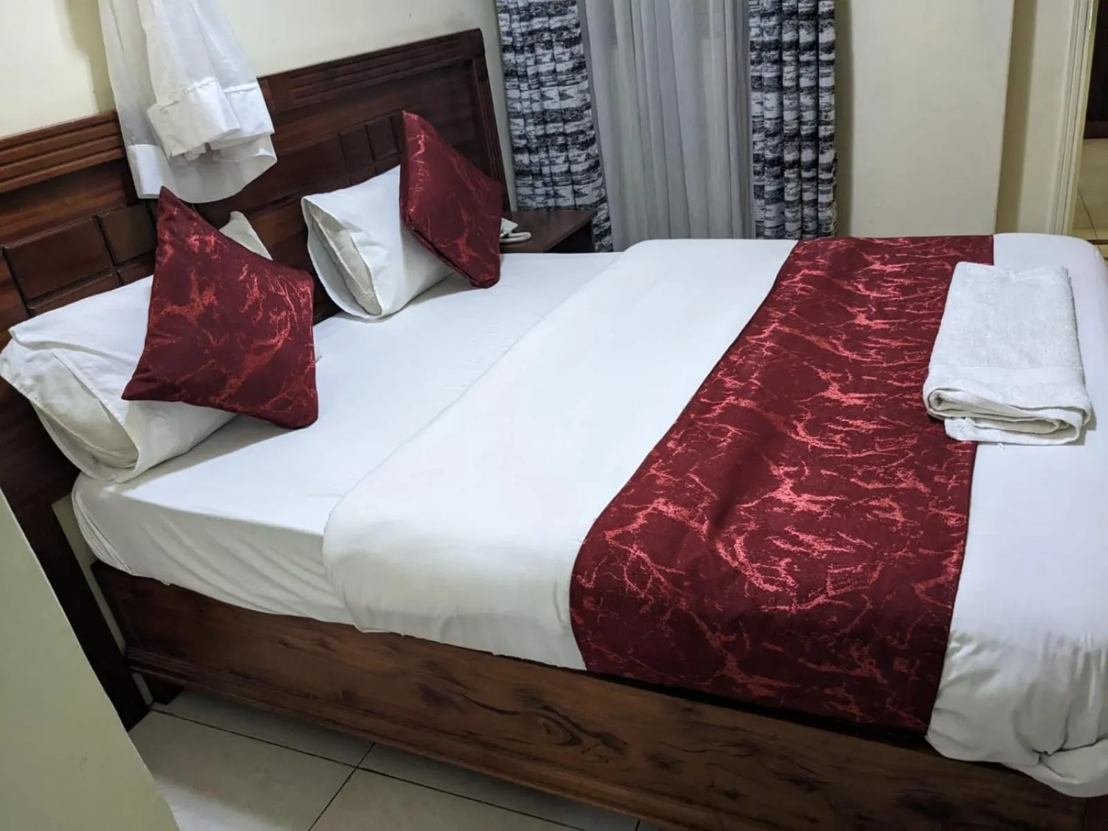 Bed in Epitome Times Hotel