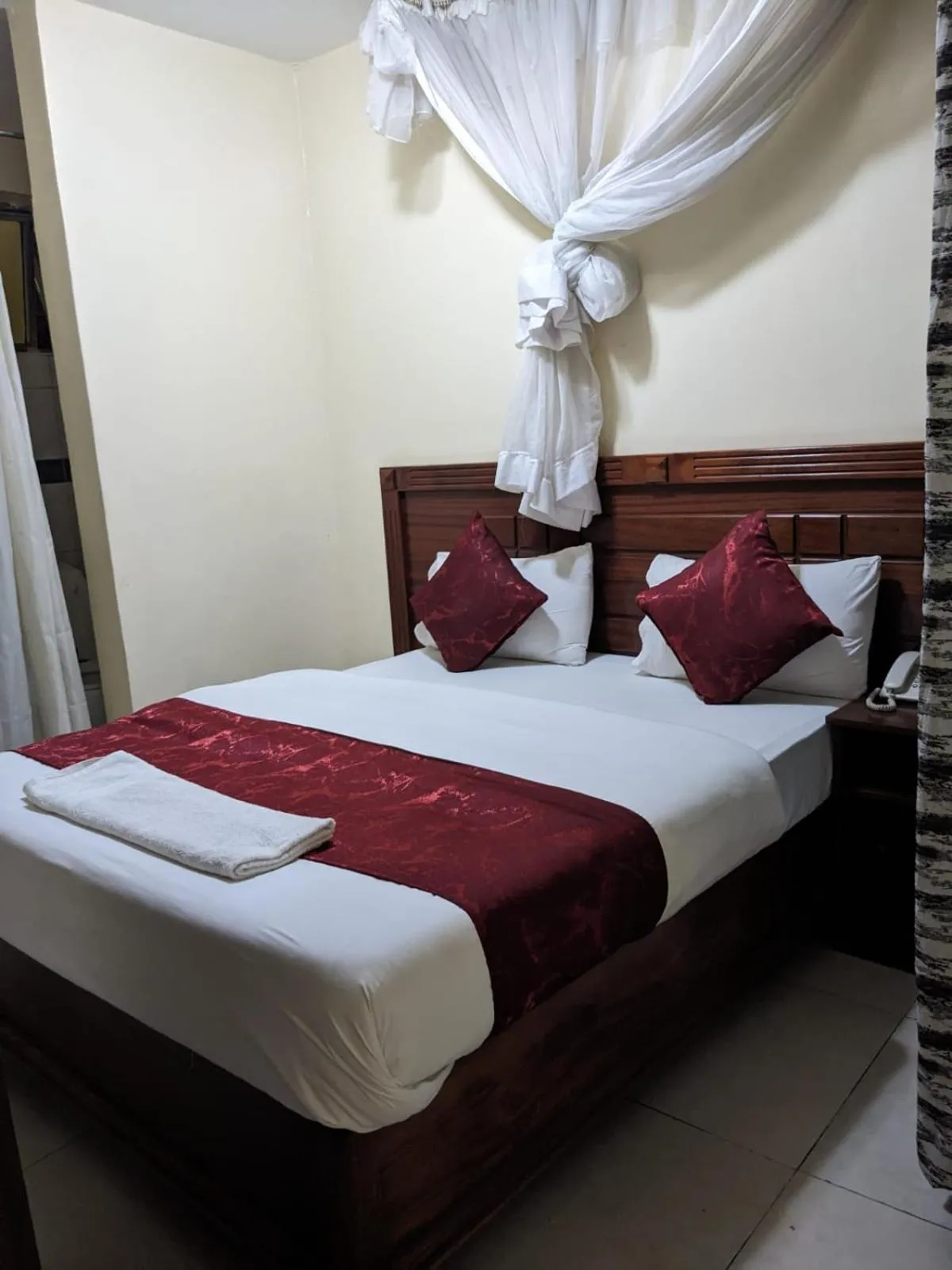 Bed in Epitome Times Hotel