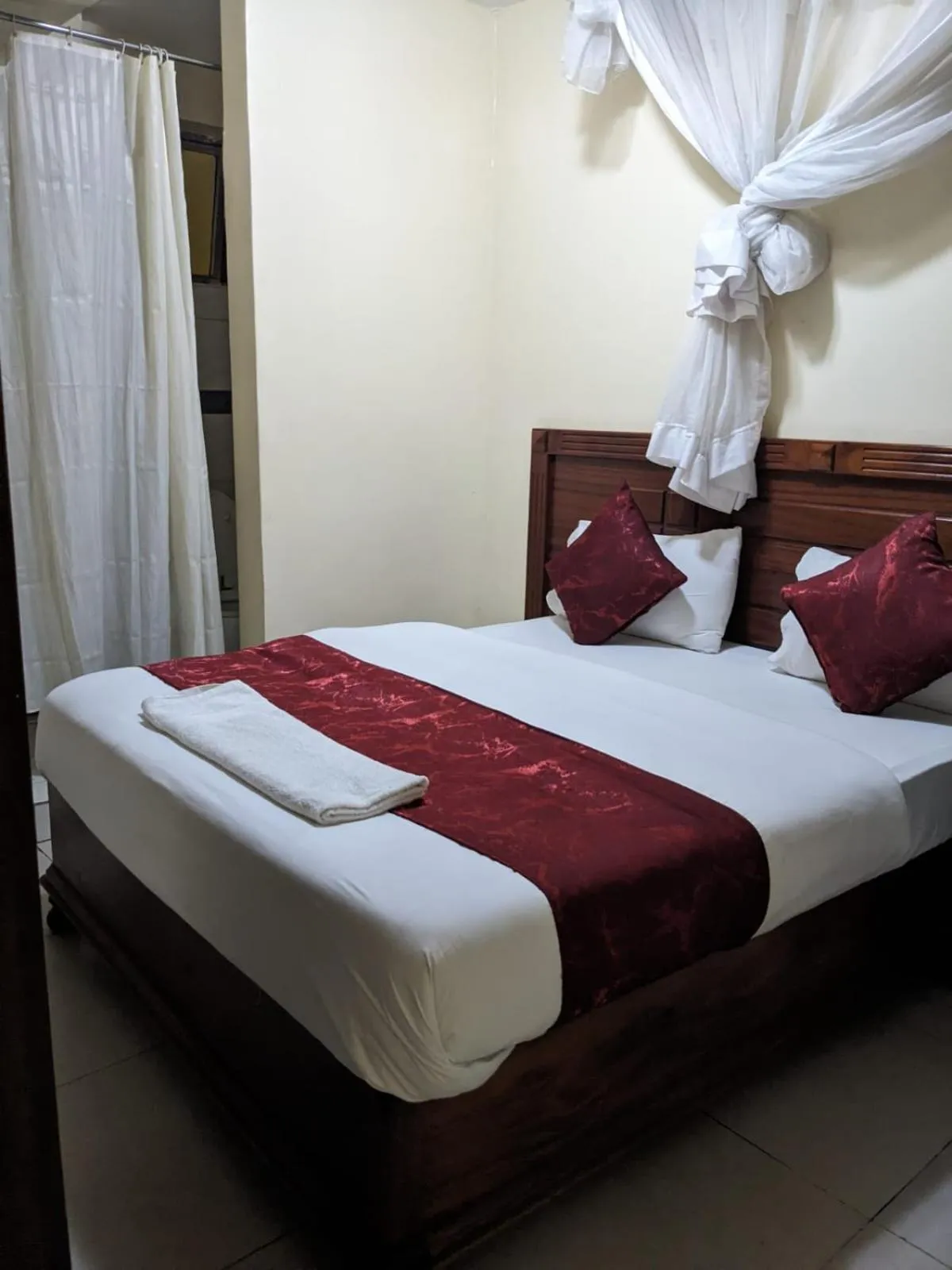Bed in Epitome Times Hotel