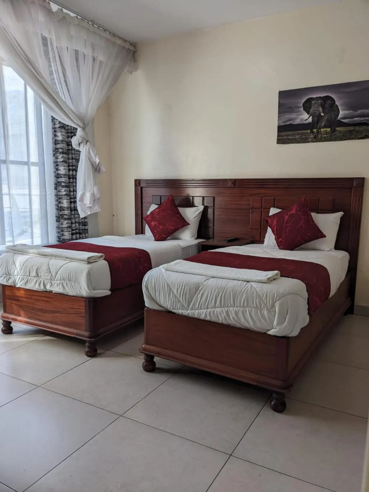 Bed in Epitome Times Hotel