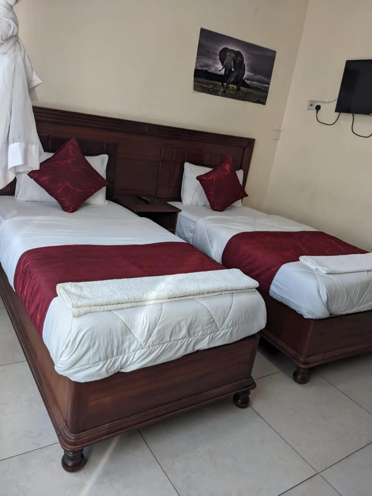 Bed in Epitome Times Hotel