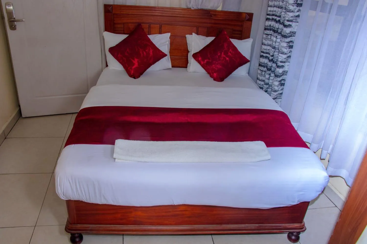 Bed in Epitome Times Hotel