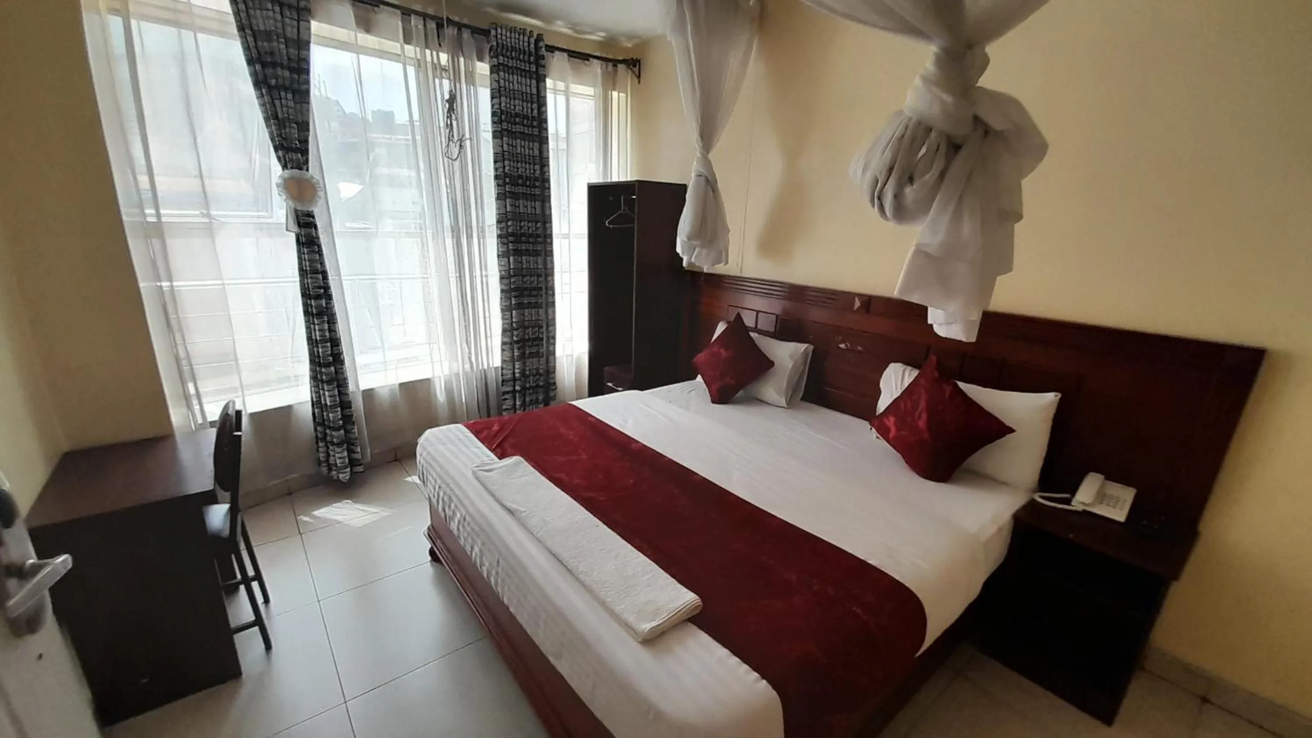 Bed in Epitome Times Hotel