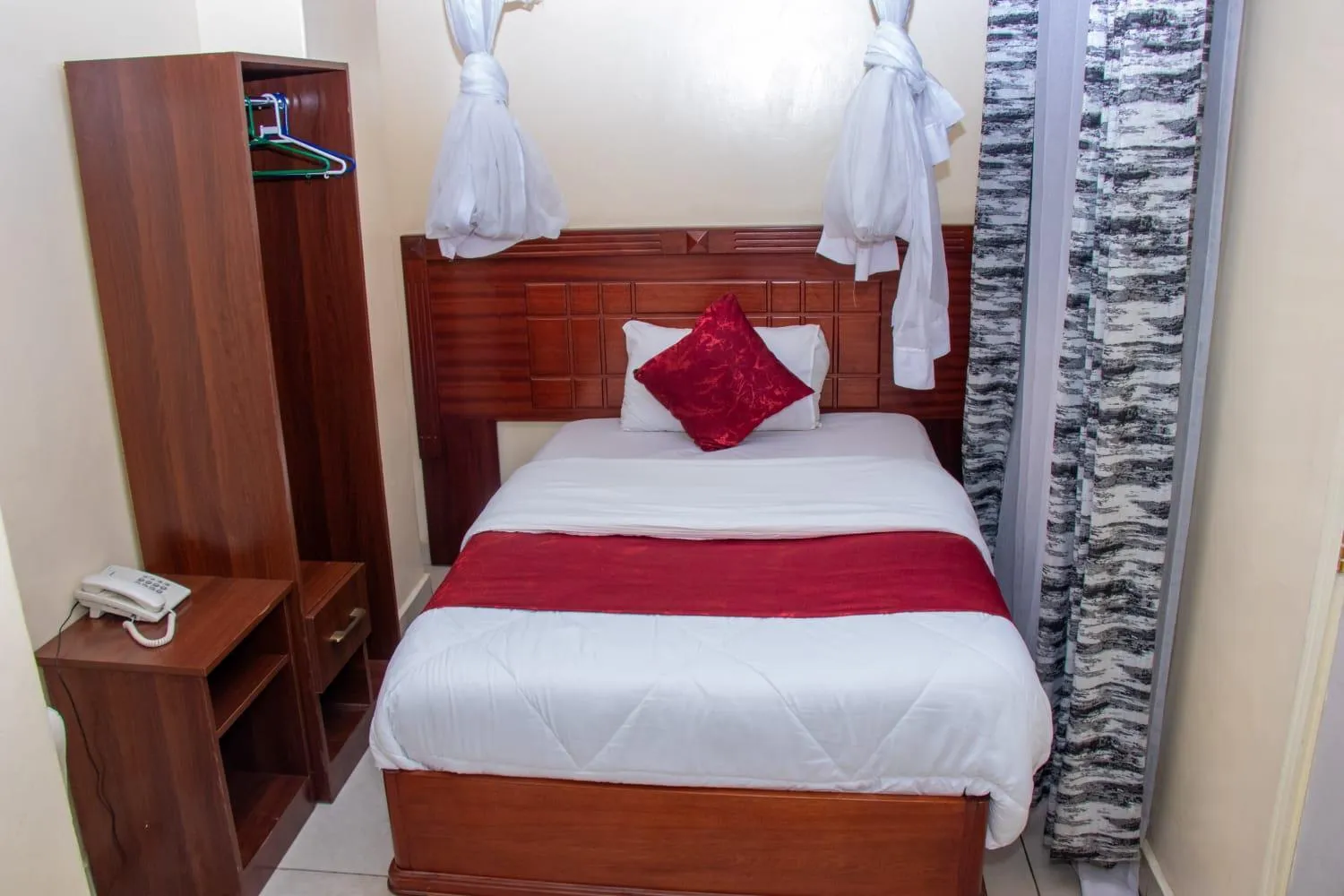 Bed in Epitome Times Hotel