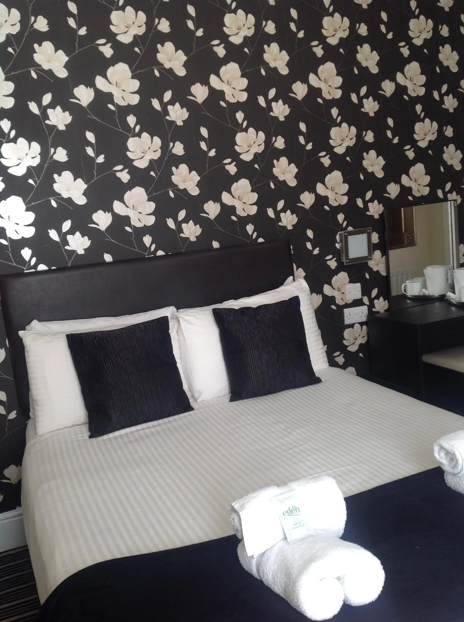 Decorative detail, Bed in Happy Return Hotel