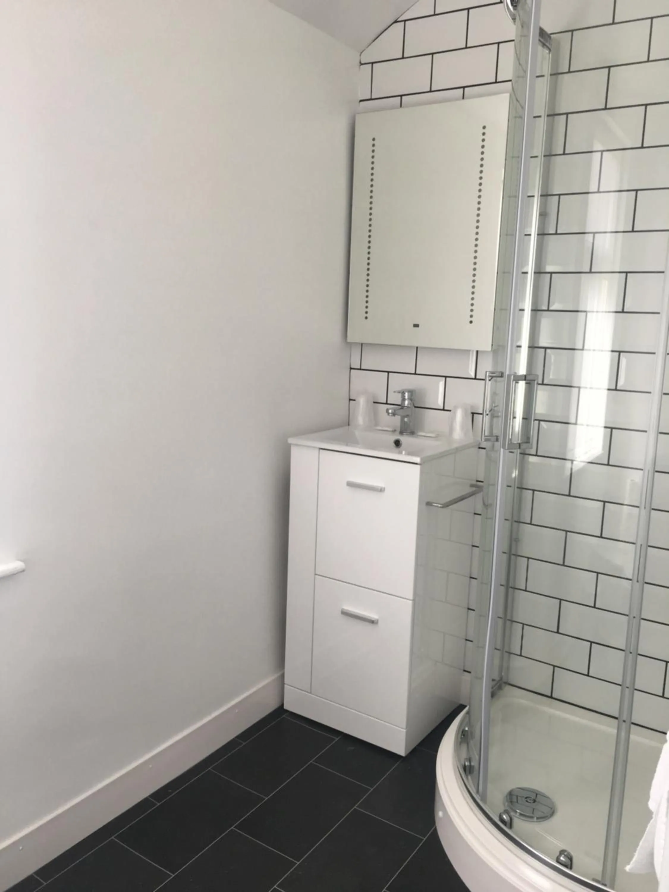 Bathroom in Happy Return Hotel