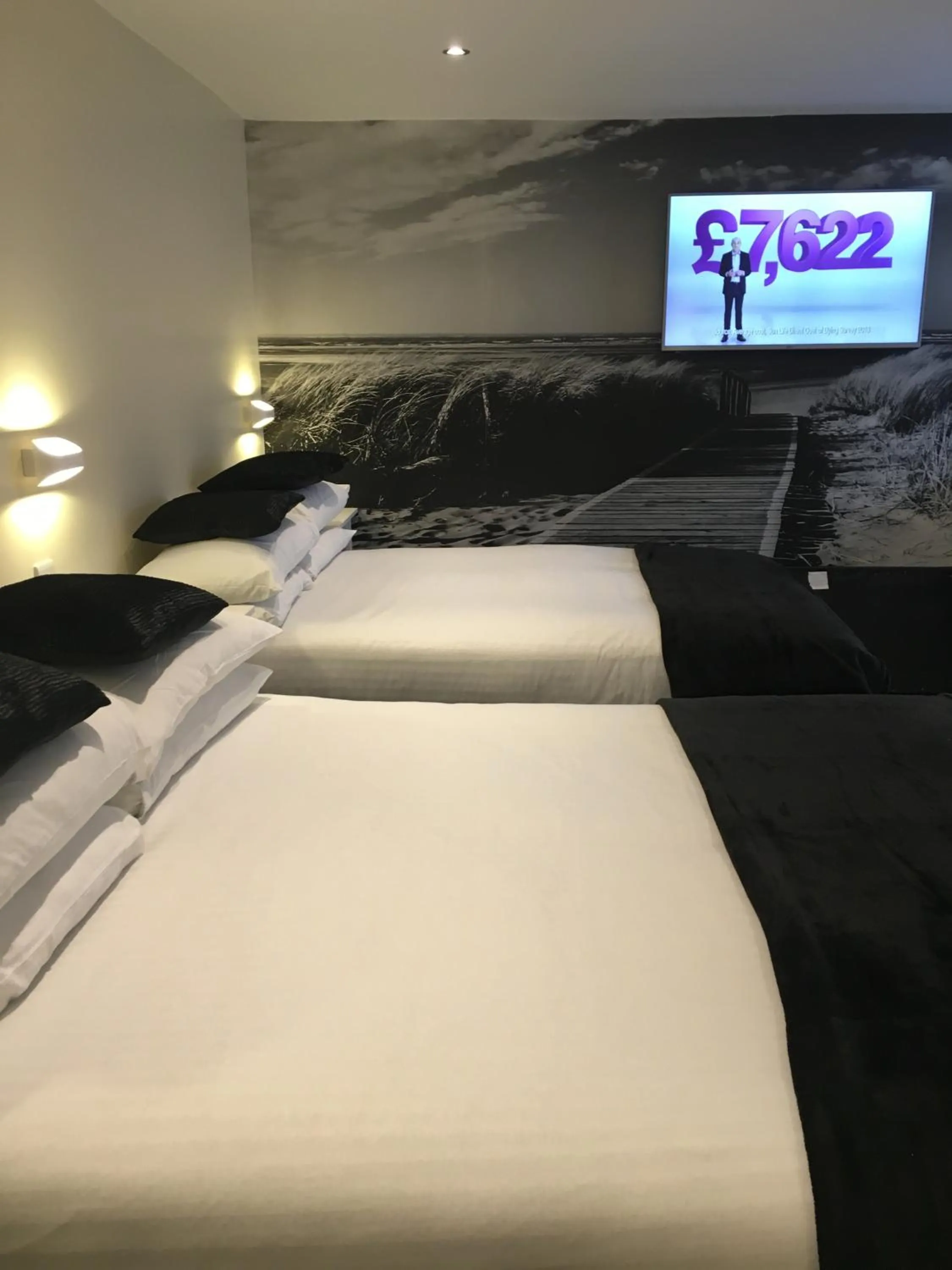 Bed in Happy Return Hotel