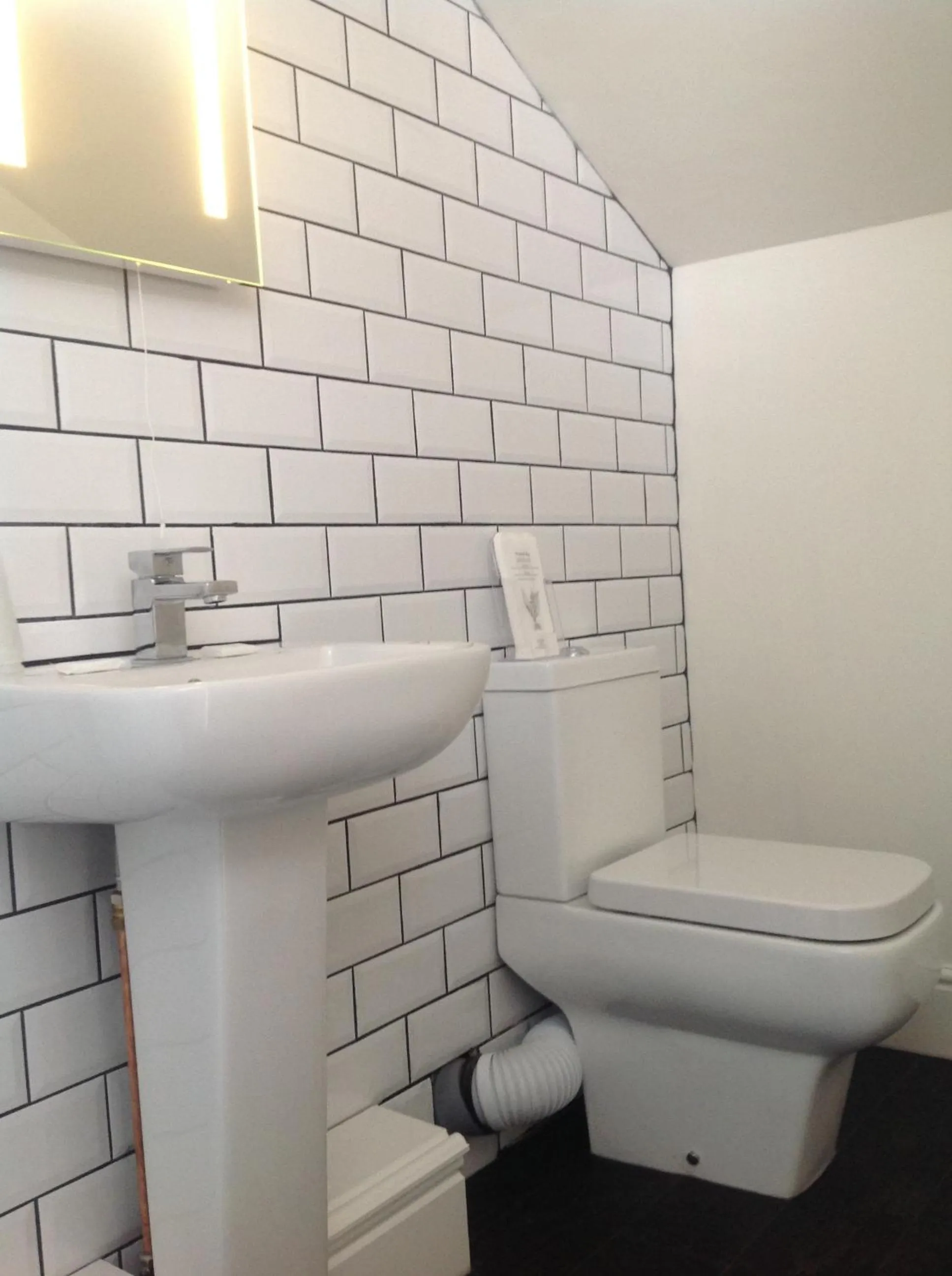 Bathroom in Happy Return Hotel