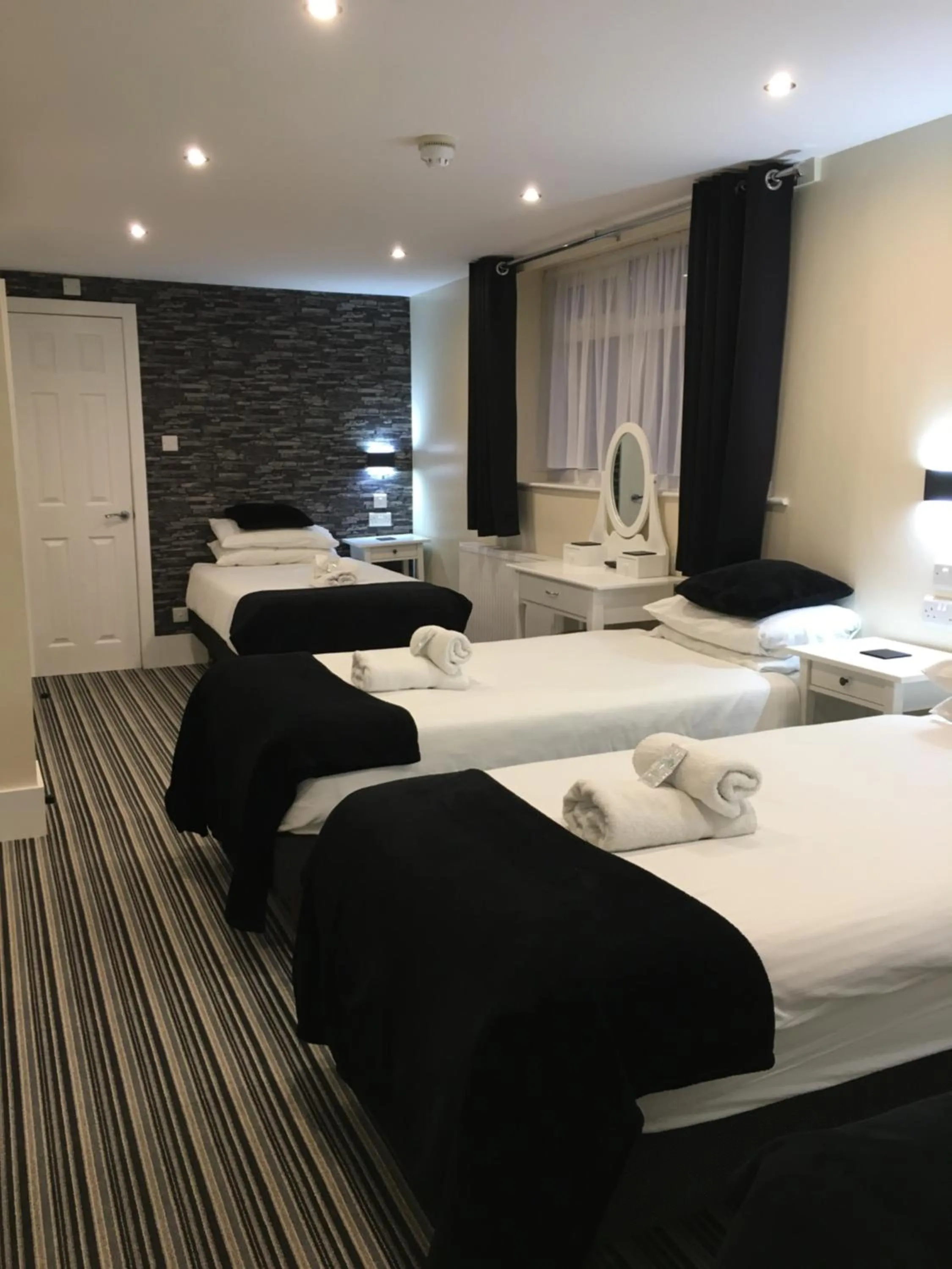 Bedroom, Bed in Happy Return Hotel