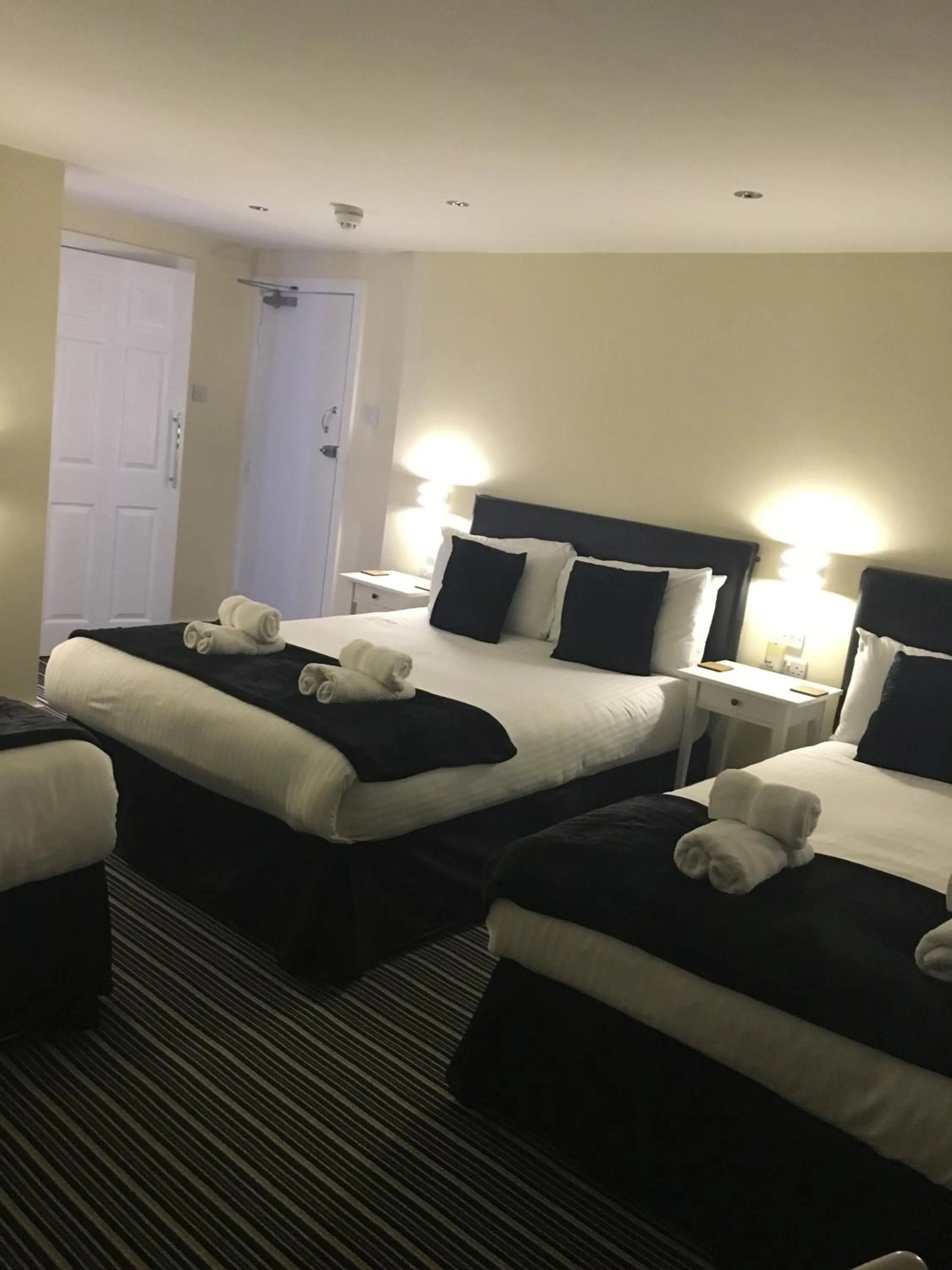 Bed in Happy Return Hotel