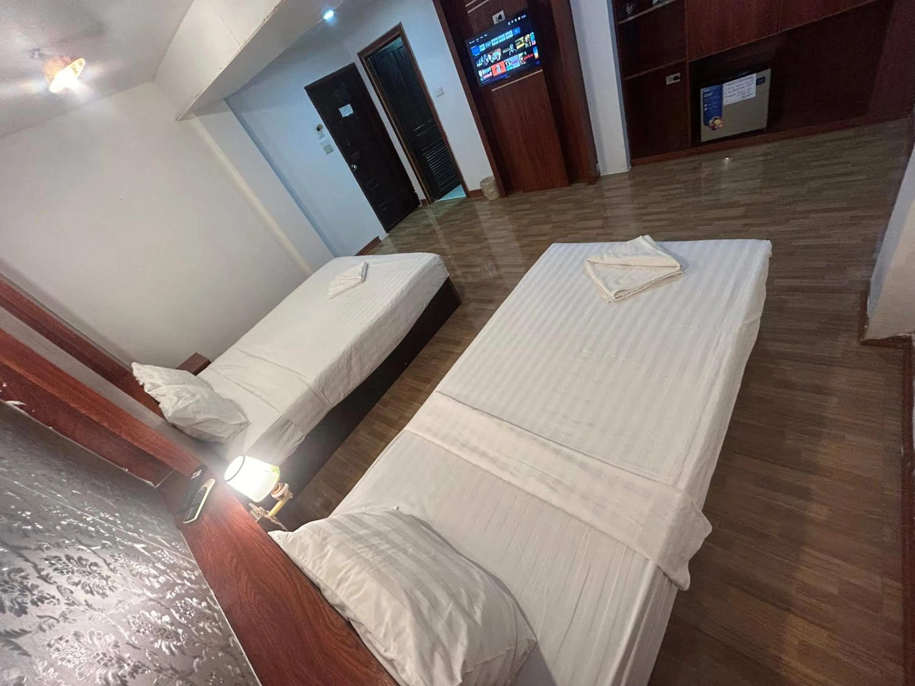 Photo of the whole room, Bed in Vang Vieng Sky Mountain View Hotel