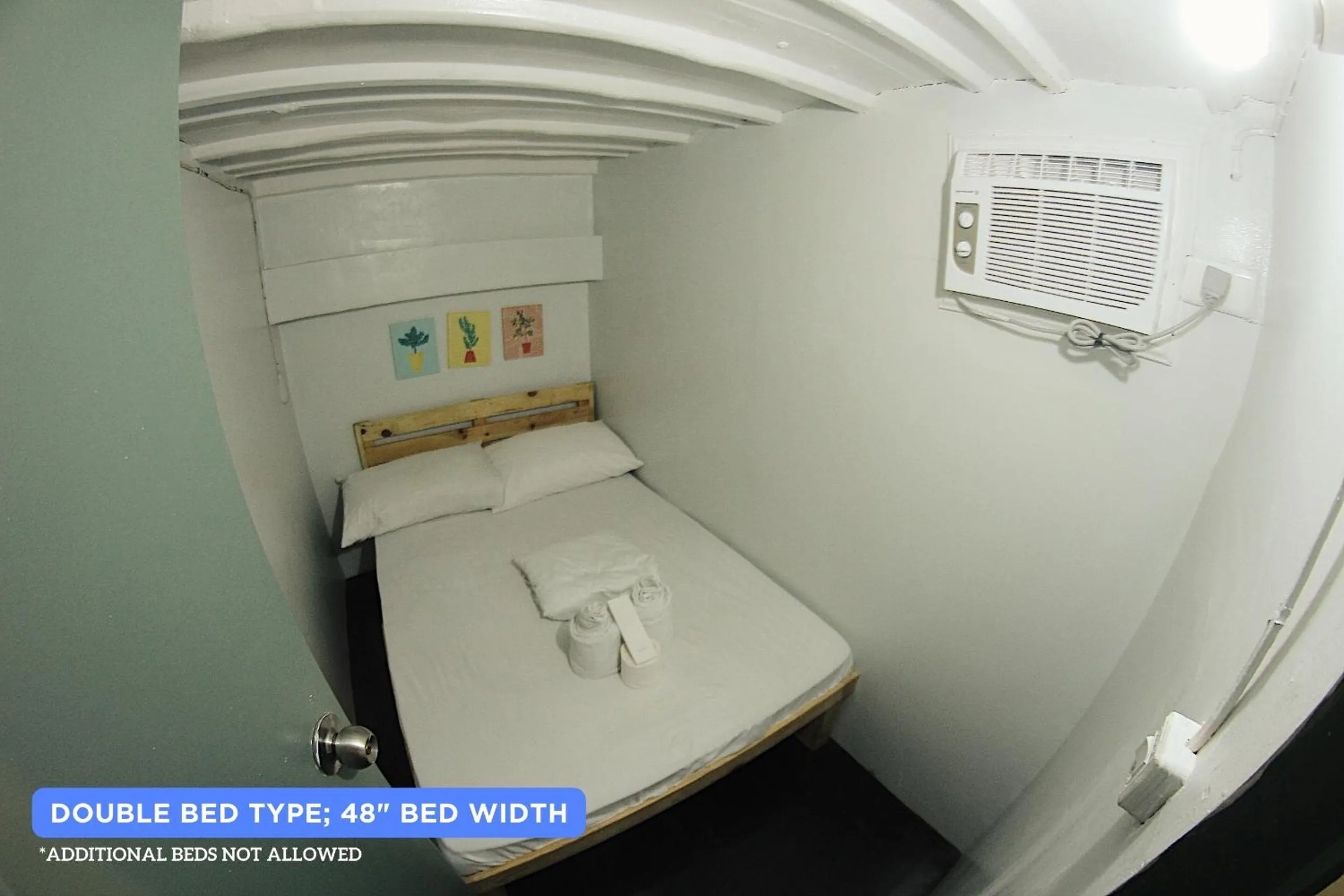 Bed in Dickem's Transient House