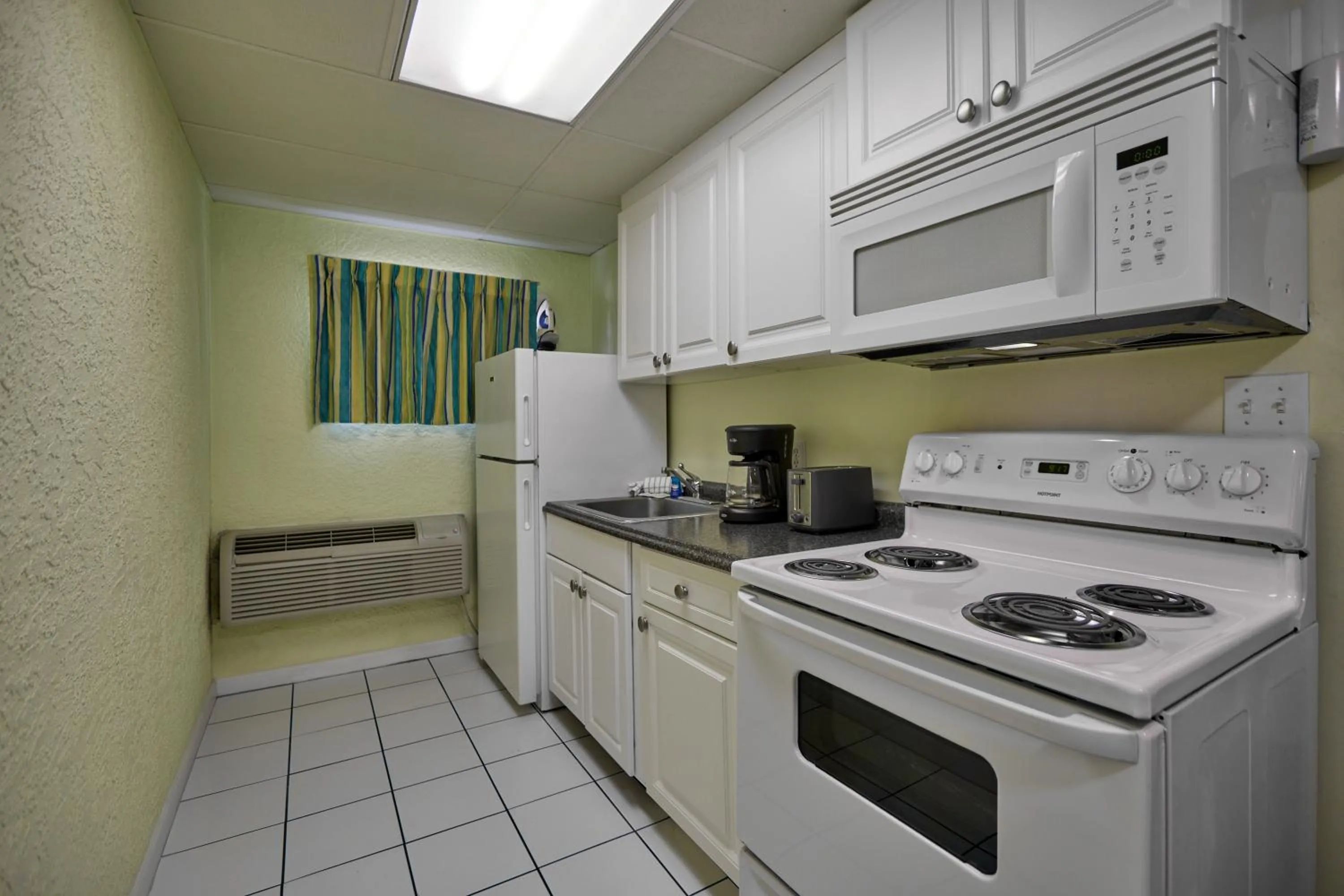 Kitchen or kitchenette in Palmetto Beachfront Hotel, a By The Sea Resort