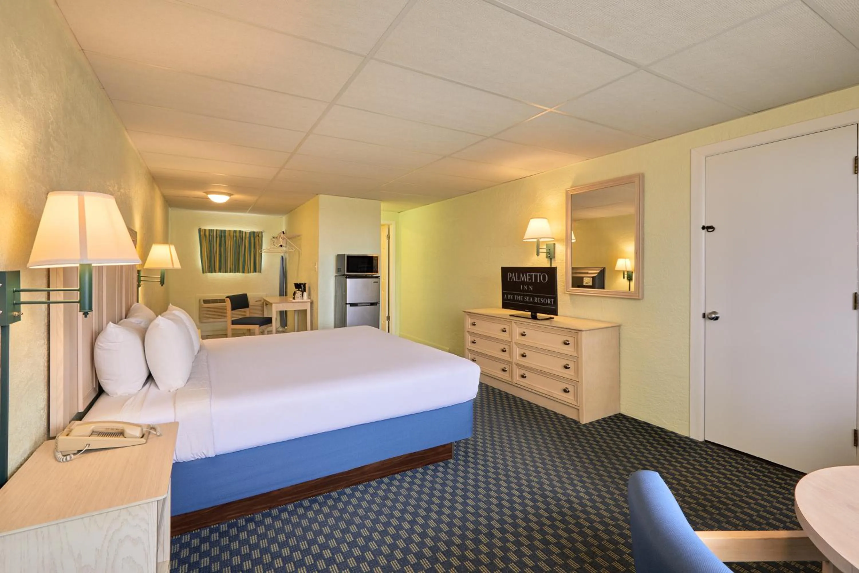 Bed in Palmetto Beachfront Hotel, a By The Sea Resort