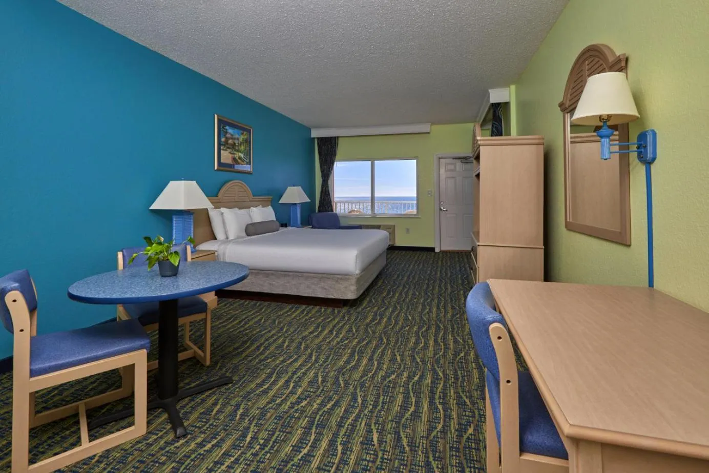 Bed in Palmetto Beachfront Hotel, a By The Sea Resort