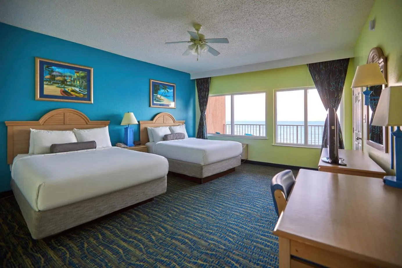 Bed in Palmetto Beachfront Hotel, a By The Sea Resort
