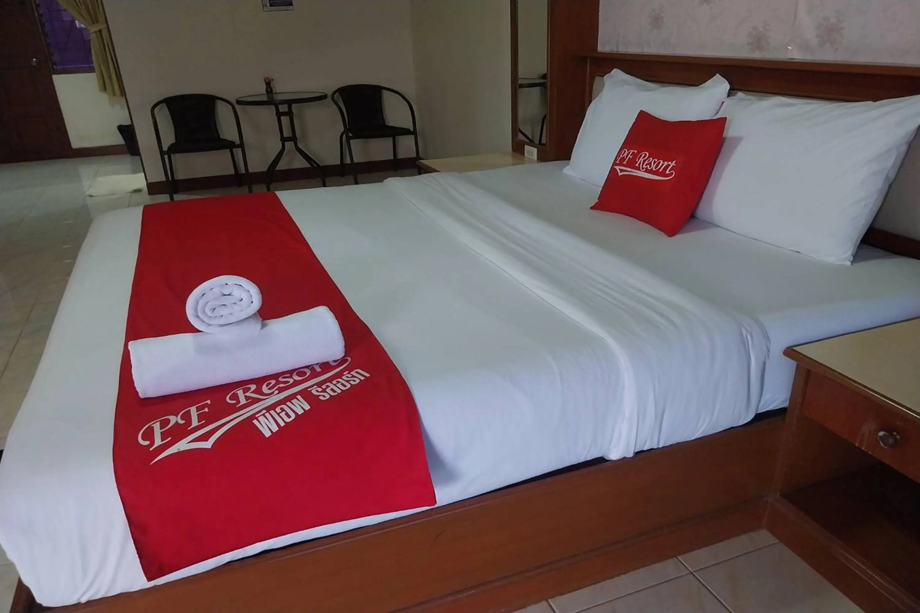 Photo of the whole room, Bed in PF Resort