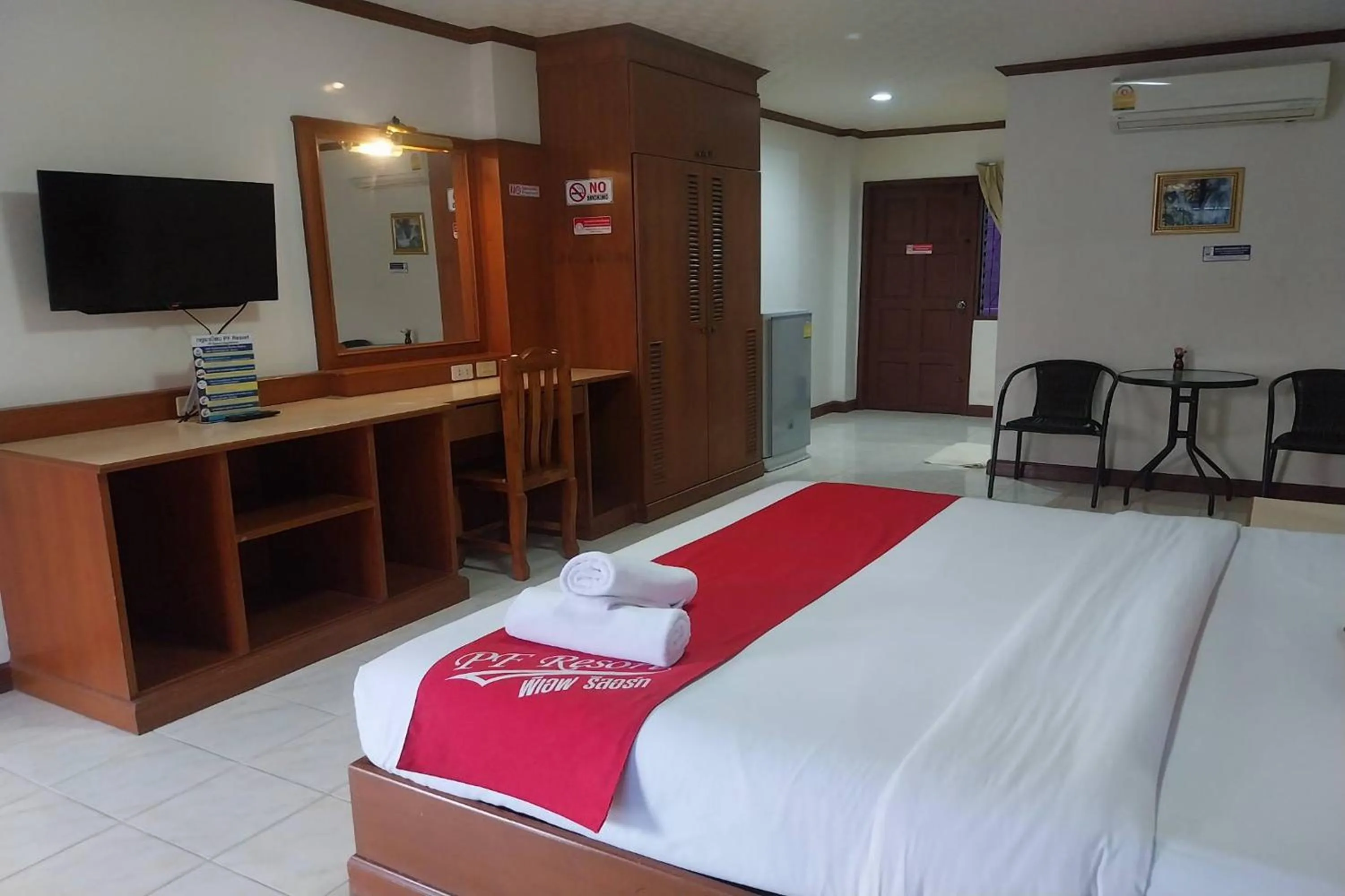 Photo of the whole room, Bed in PF Resort