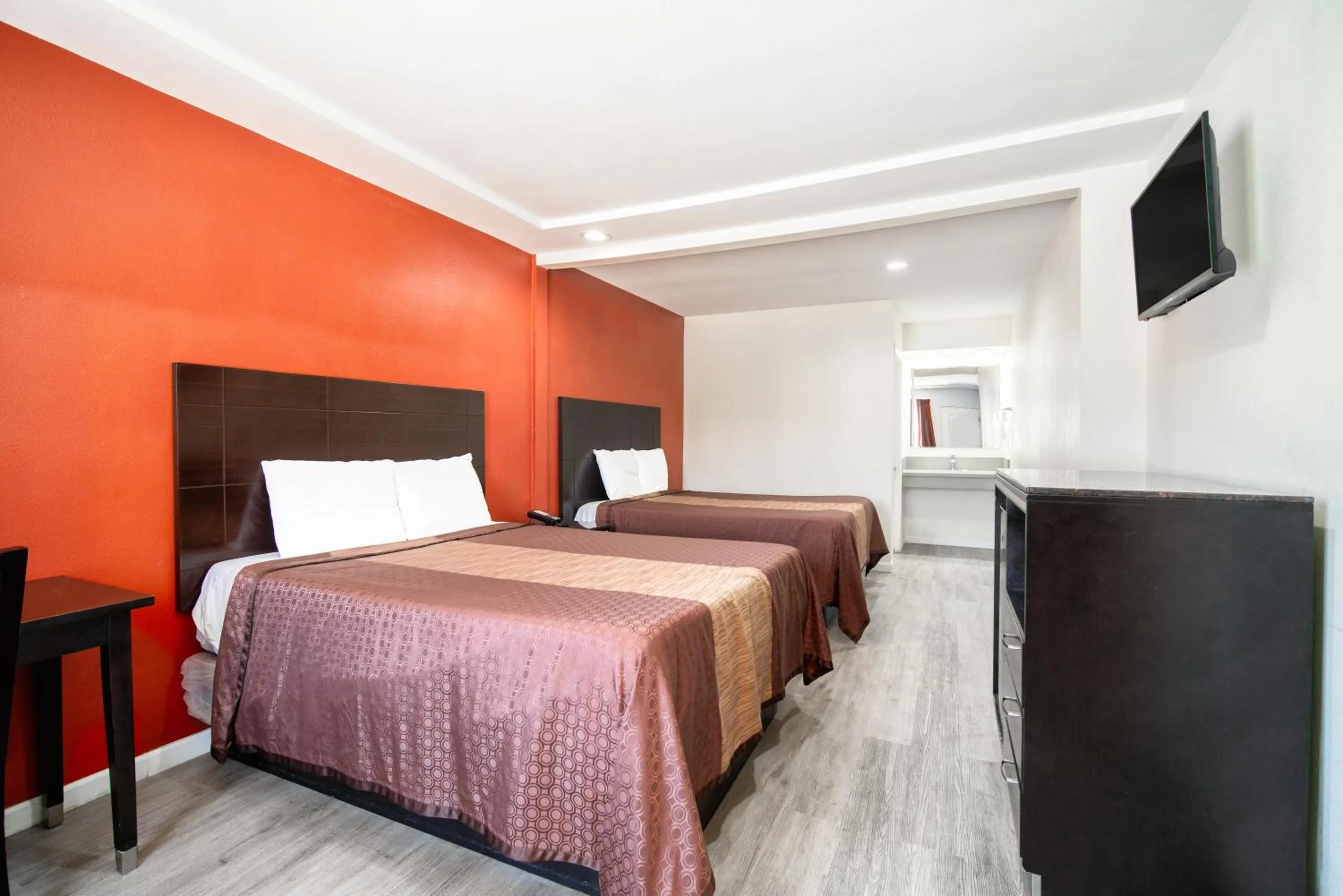 Bed in Bell Manor Motel