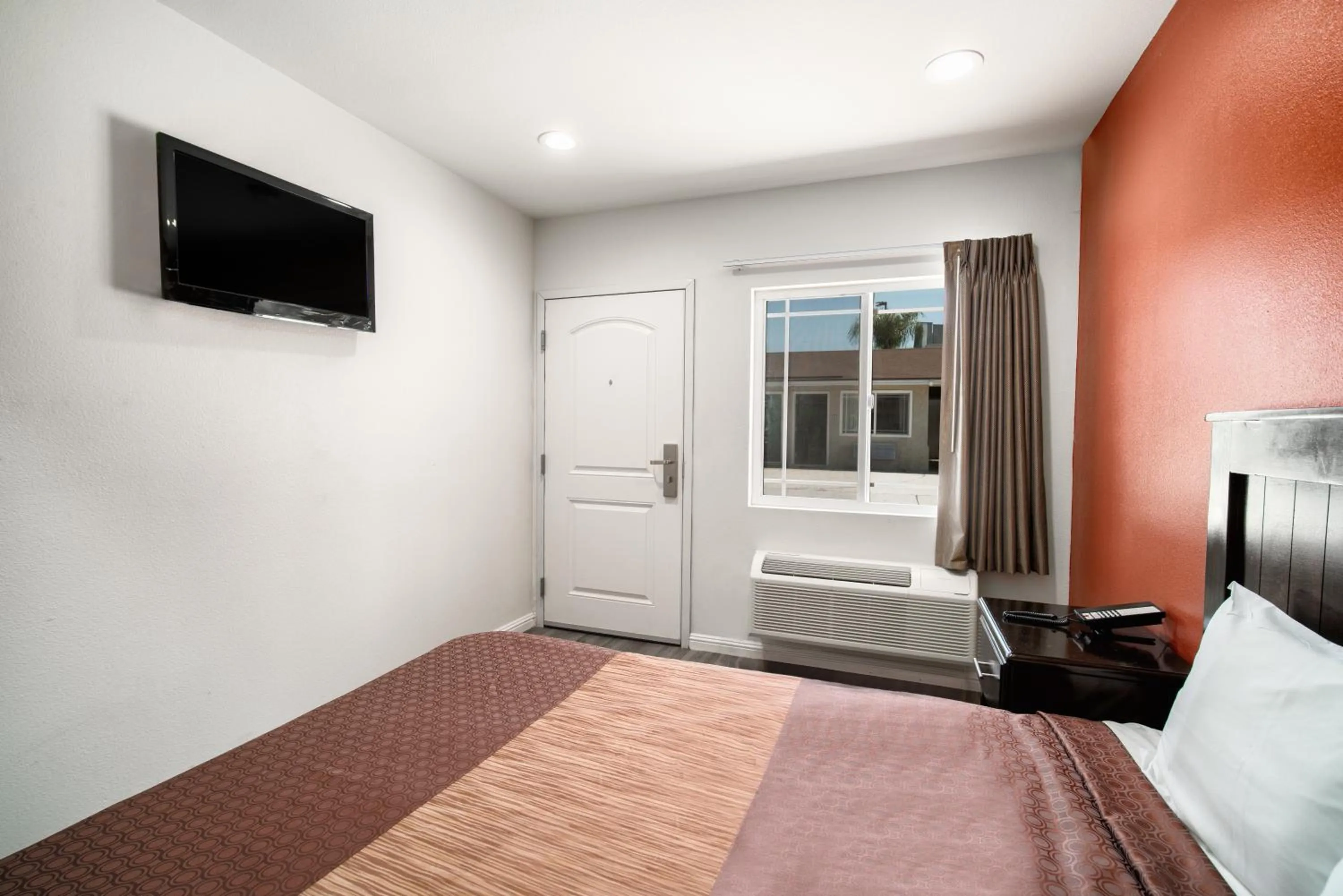 Bed in Bell Manor Motel