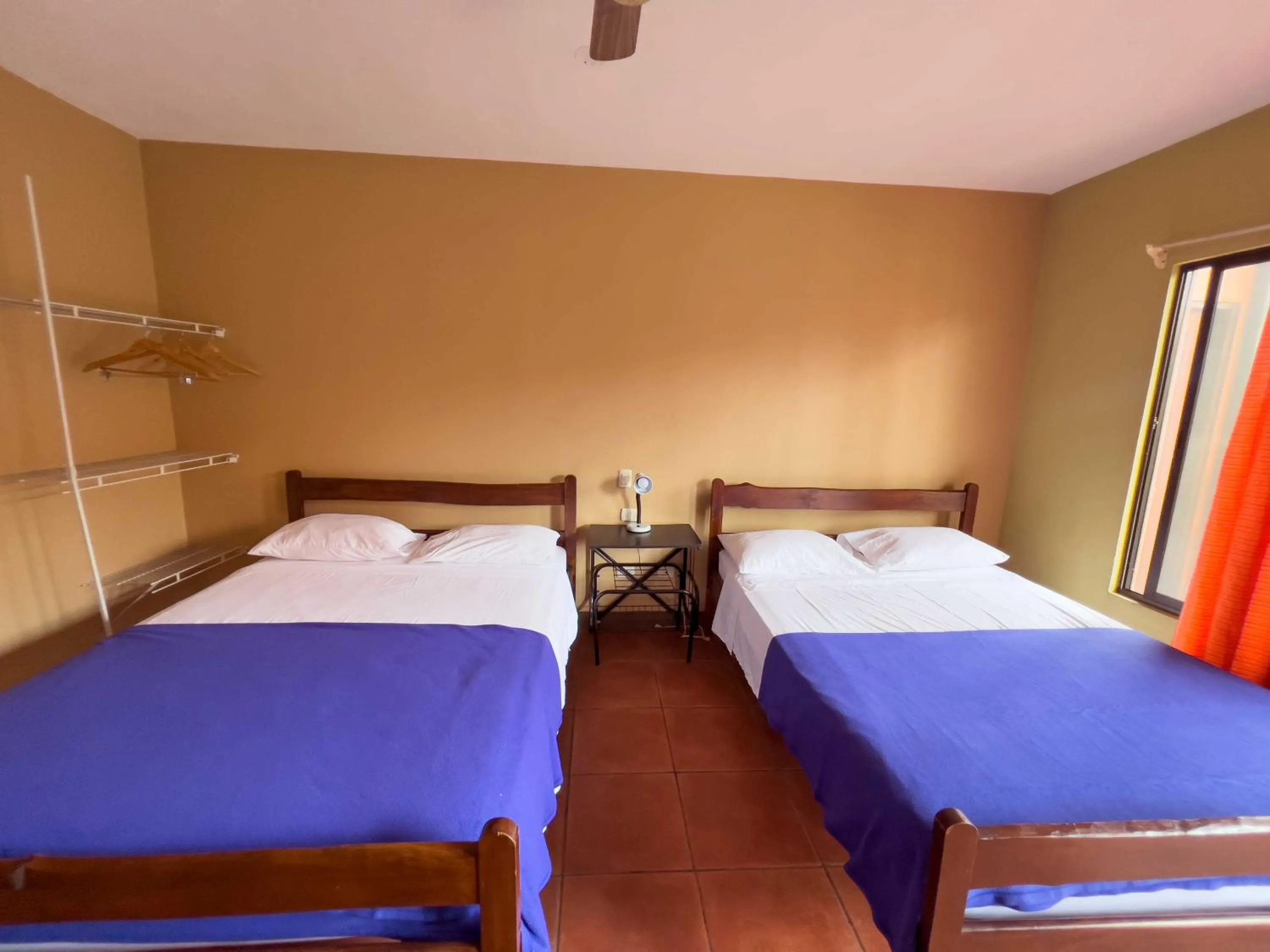 Photo of the whole room, Bed in Belen Suites