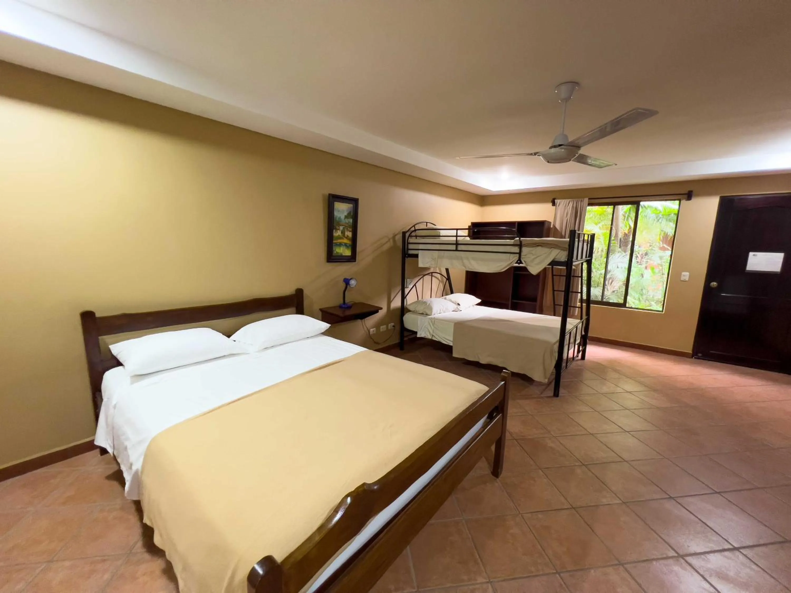 Photo of the whole room, Bed in Belen Suites