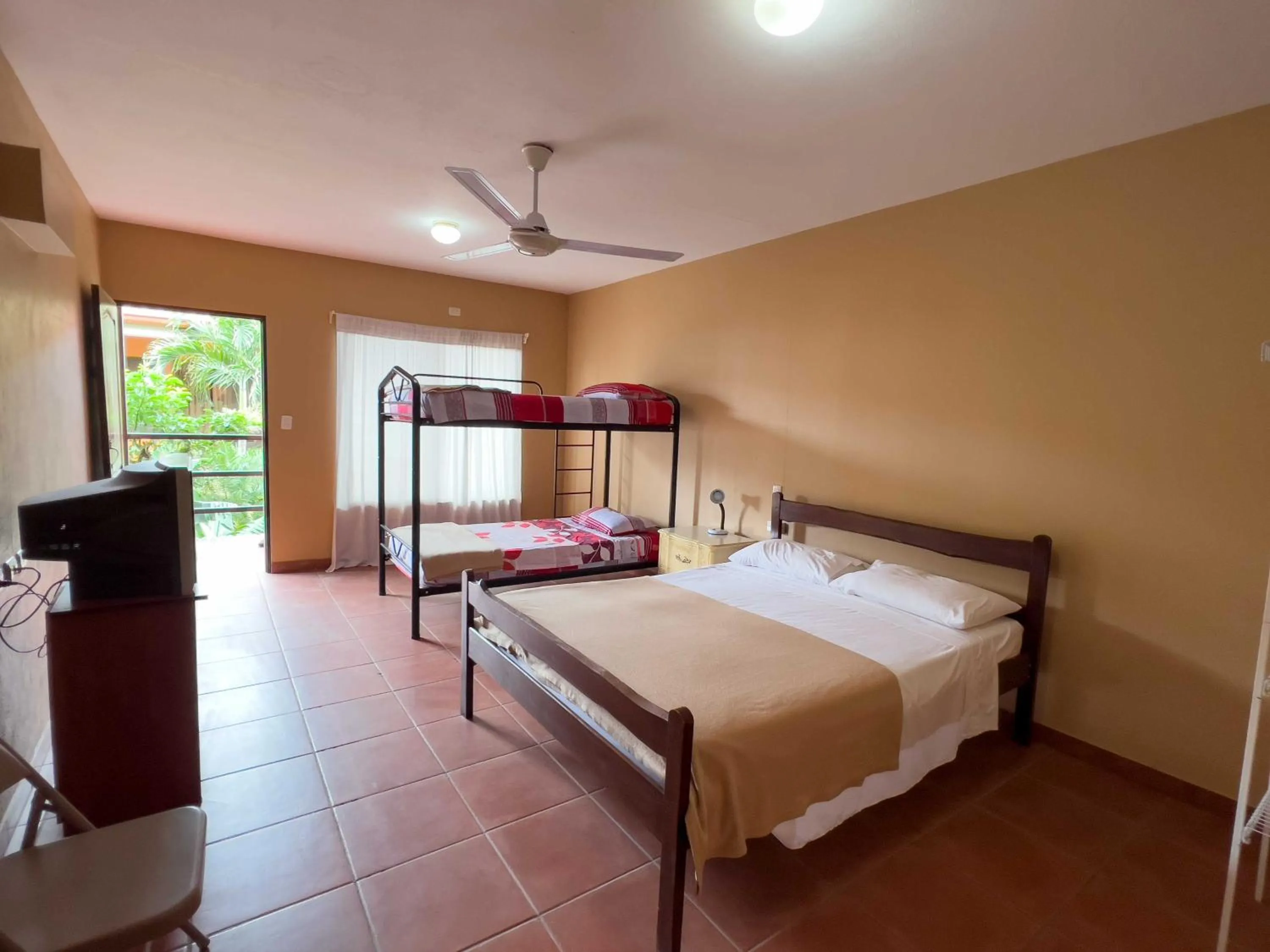 Photo of the whole room, Bed in Belen Suites