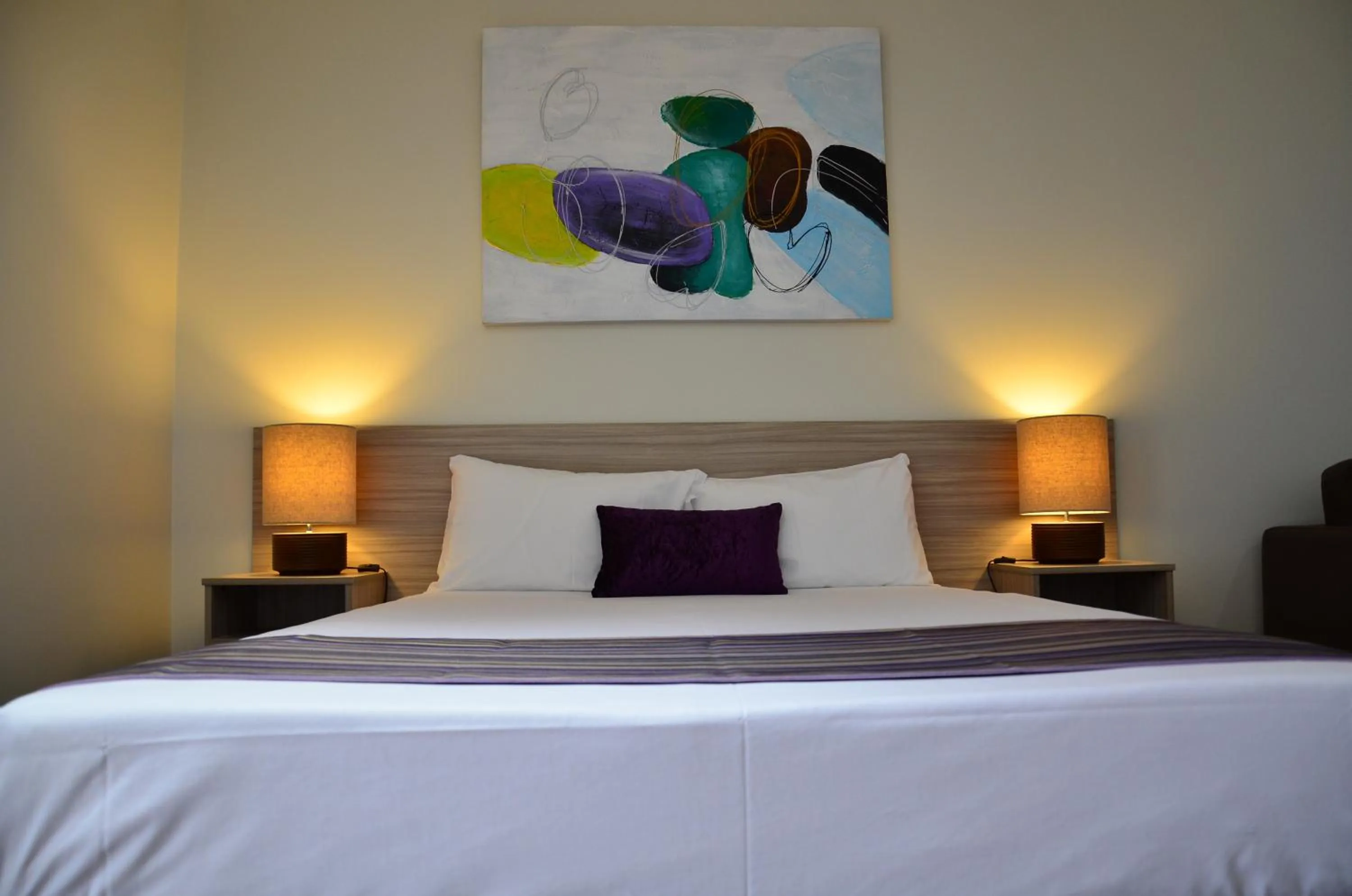 Bed in Beachside Boutique Motel Mackay