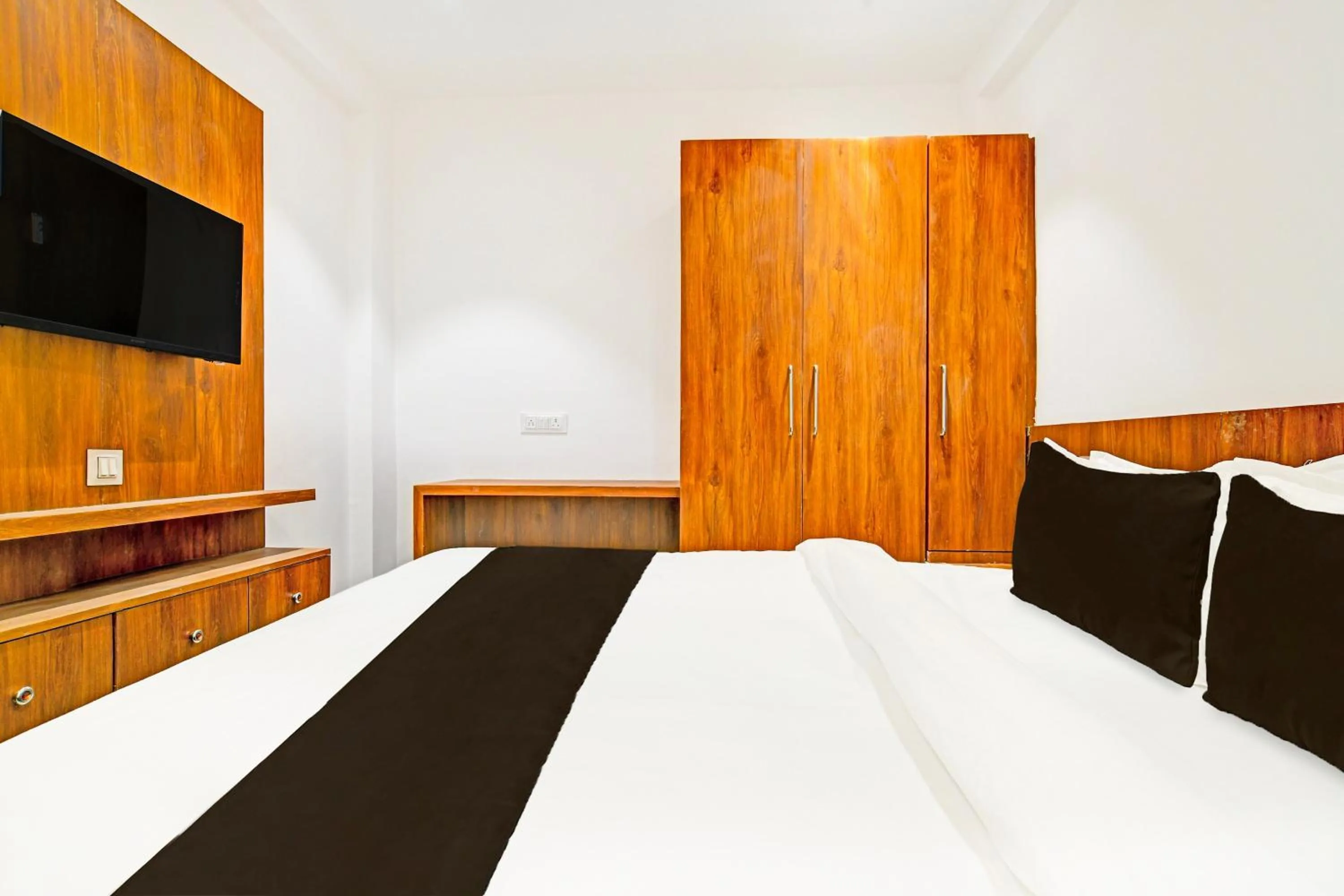 Bedroom in Hotel O Delight Stay