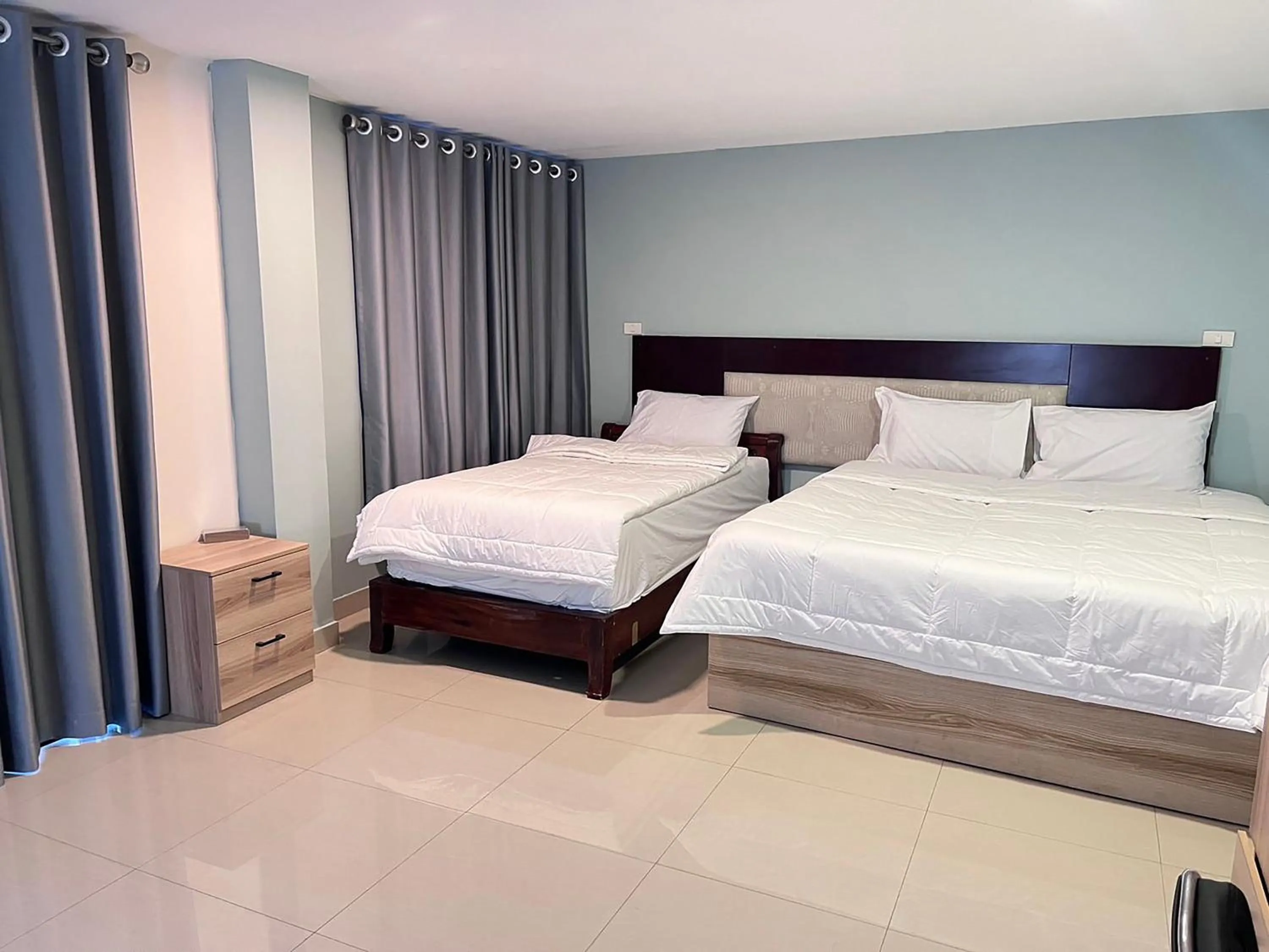 Bed in The Freelancer Hotel