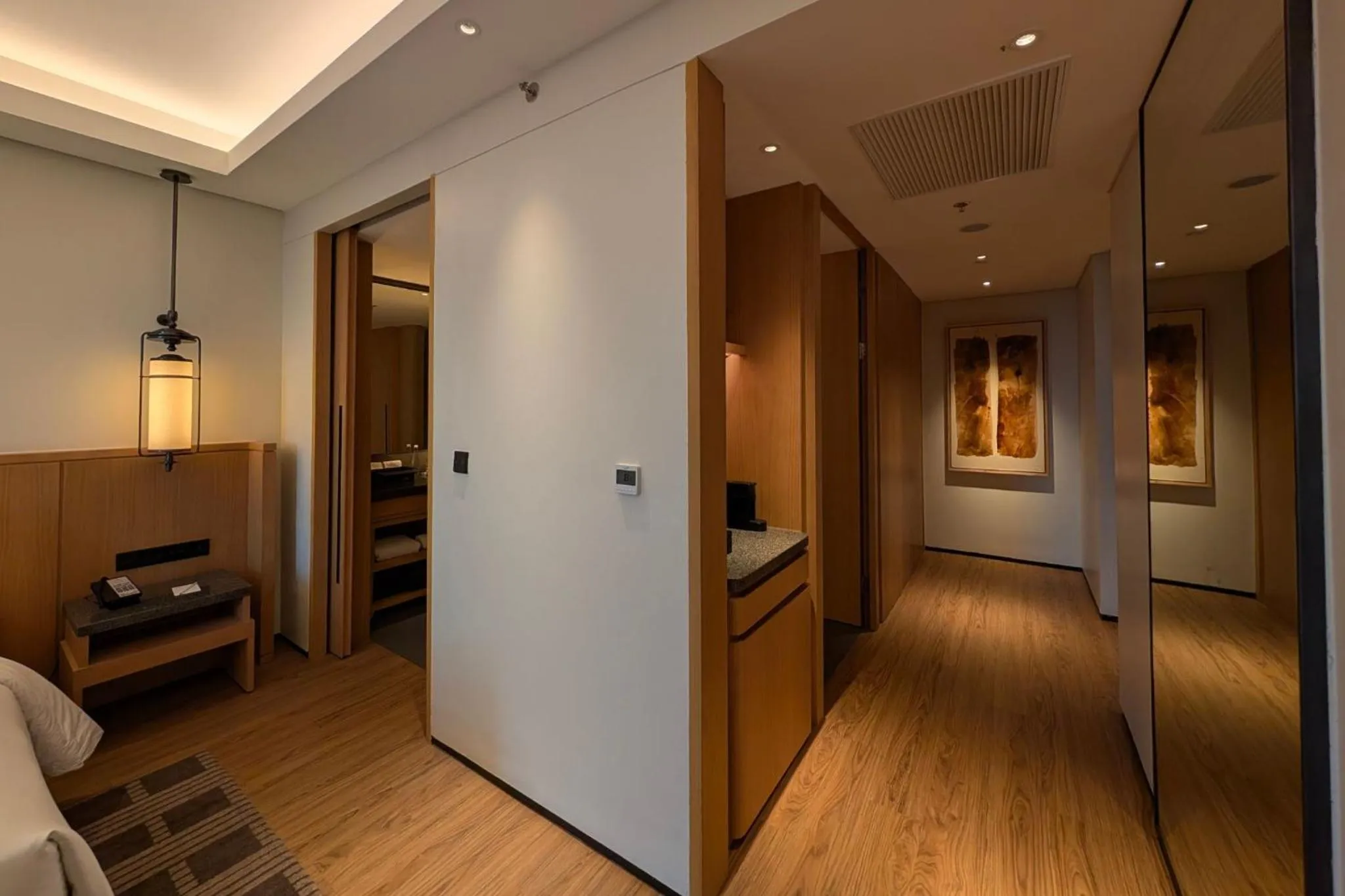 Living room, Bed in Hotel Tentrem Jakarta