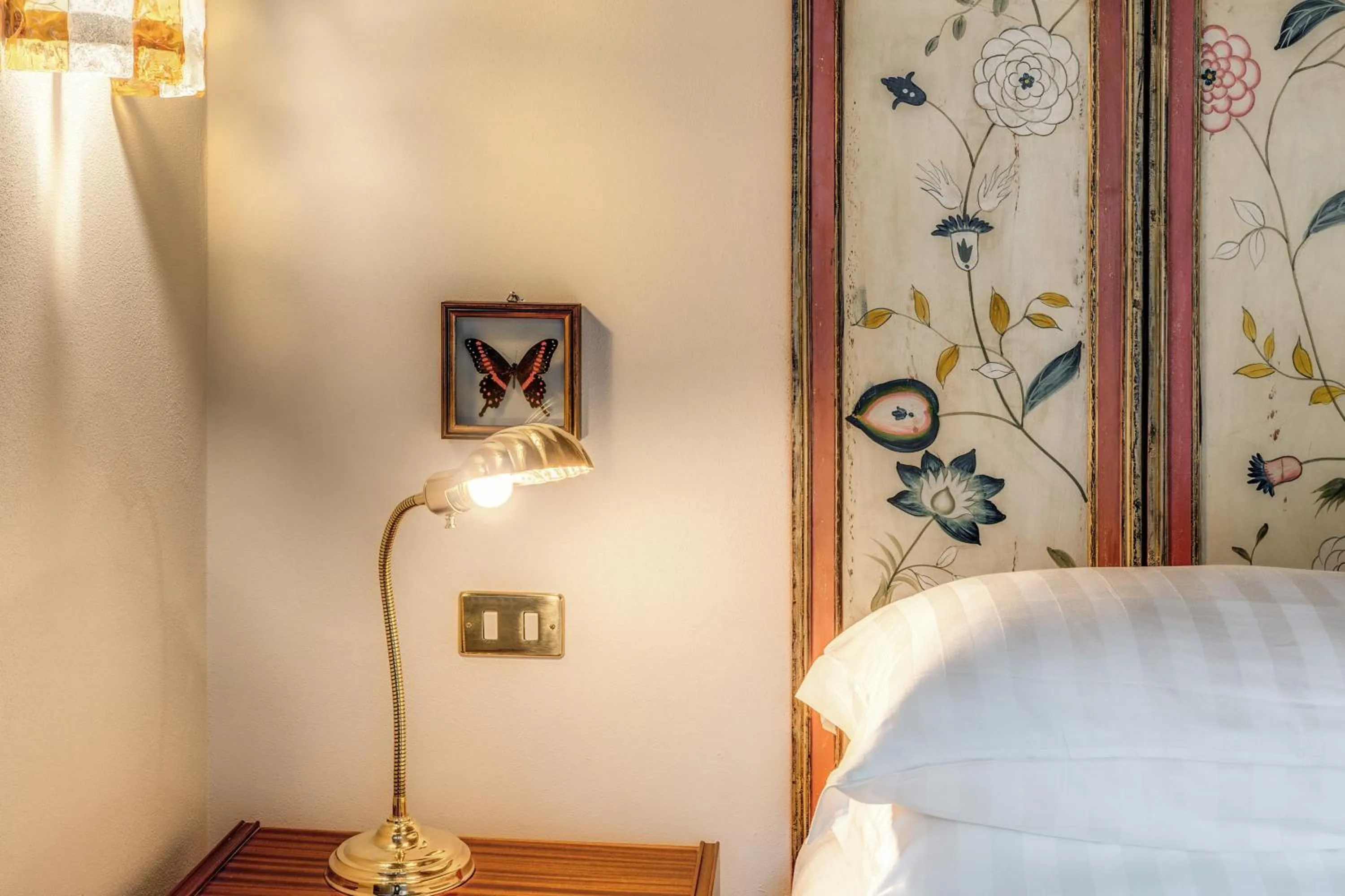 Decorative detail, Bed in Residenza Brama - Art ApartHotel