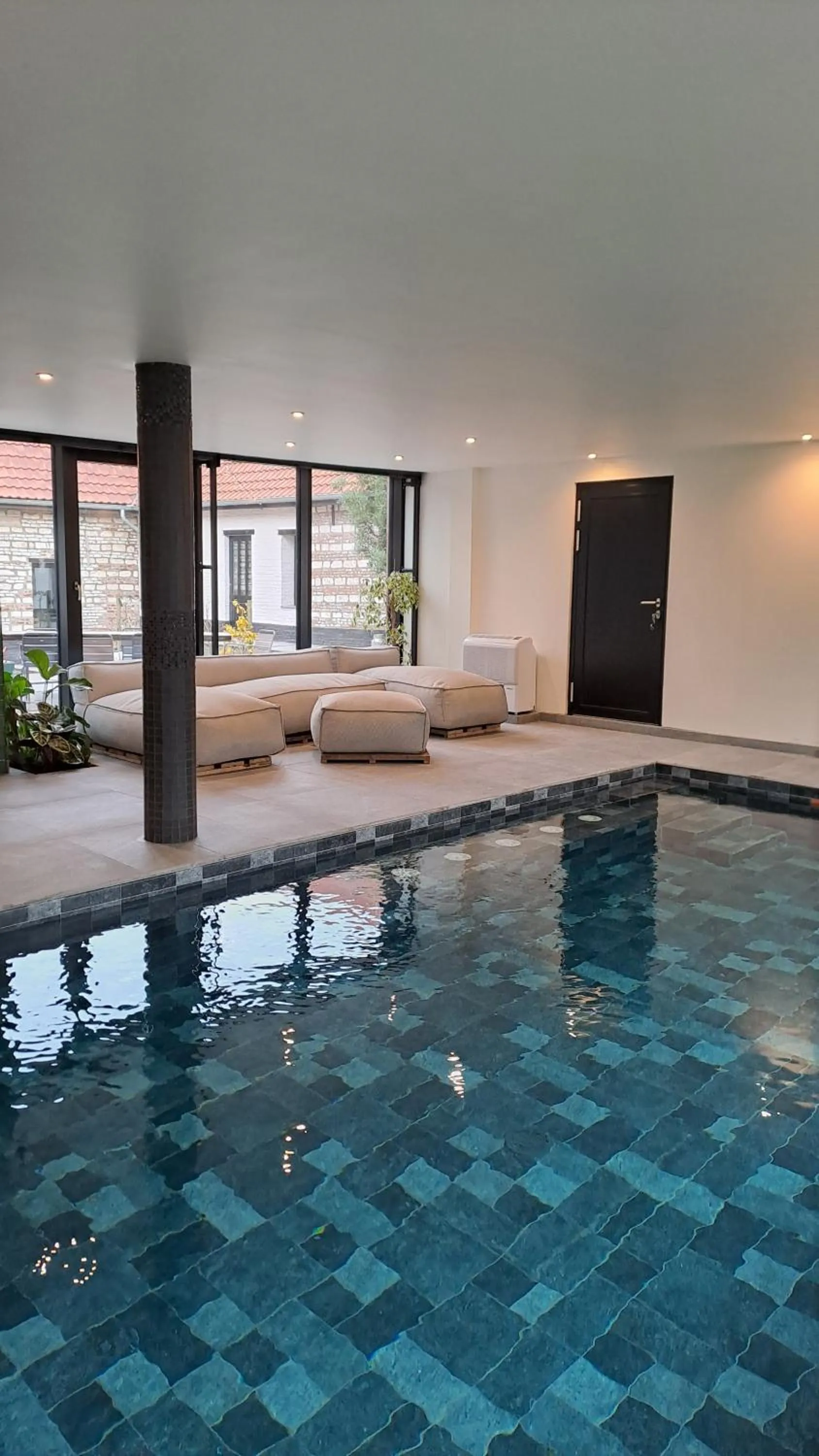 Swimming pool in Suite & SPA à La Ferme 1802