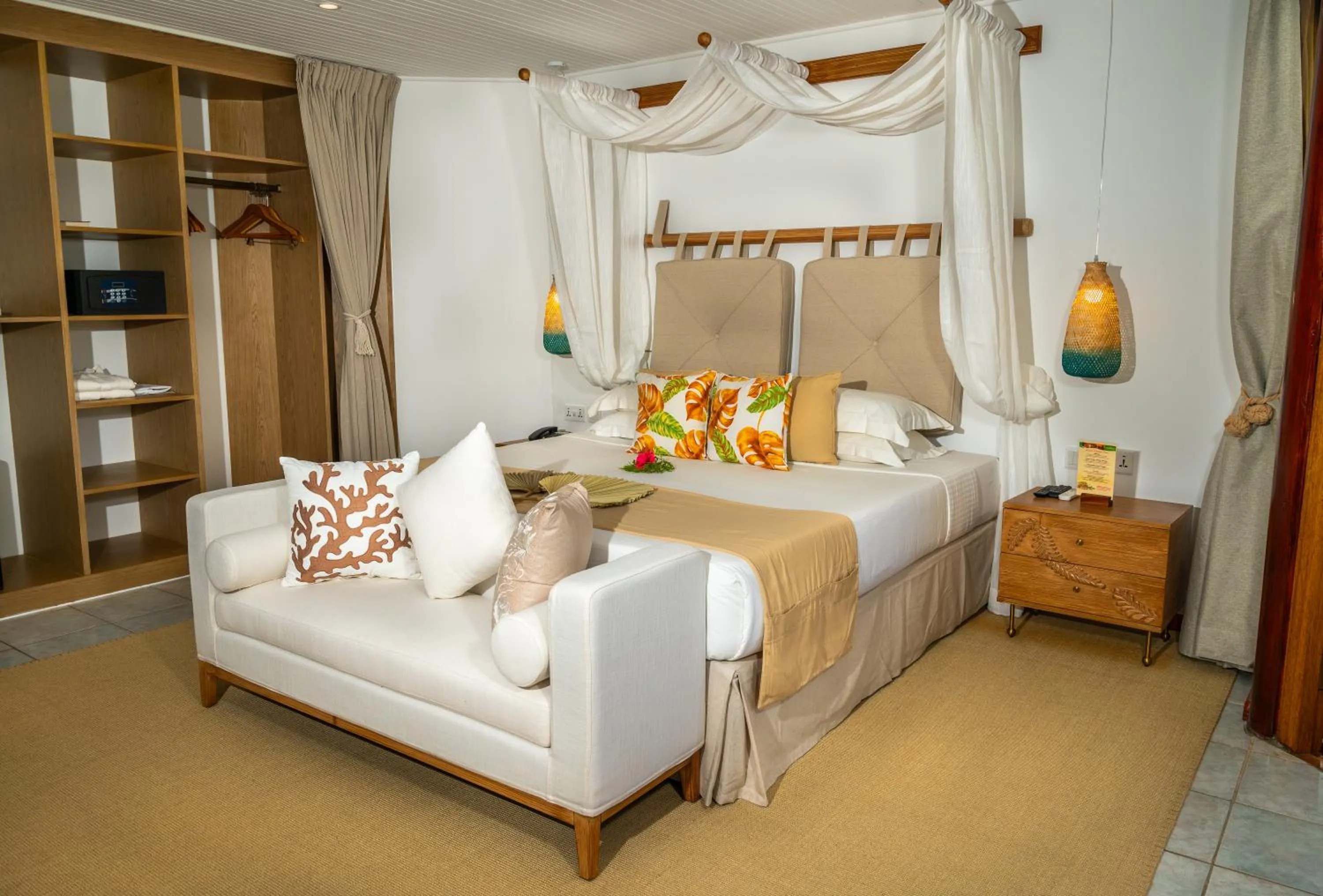 Bed in Acajou Beach Resort