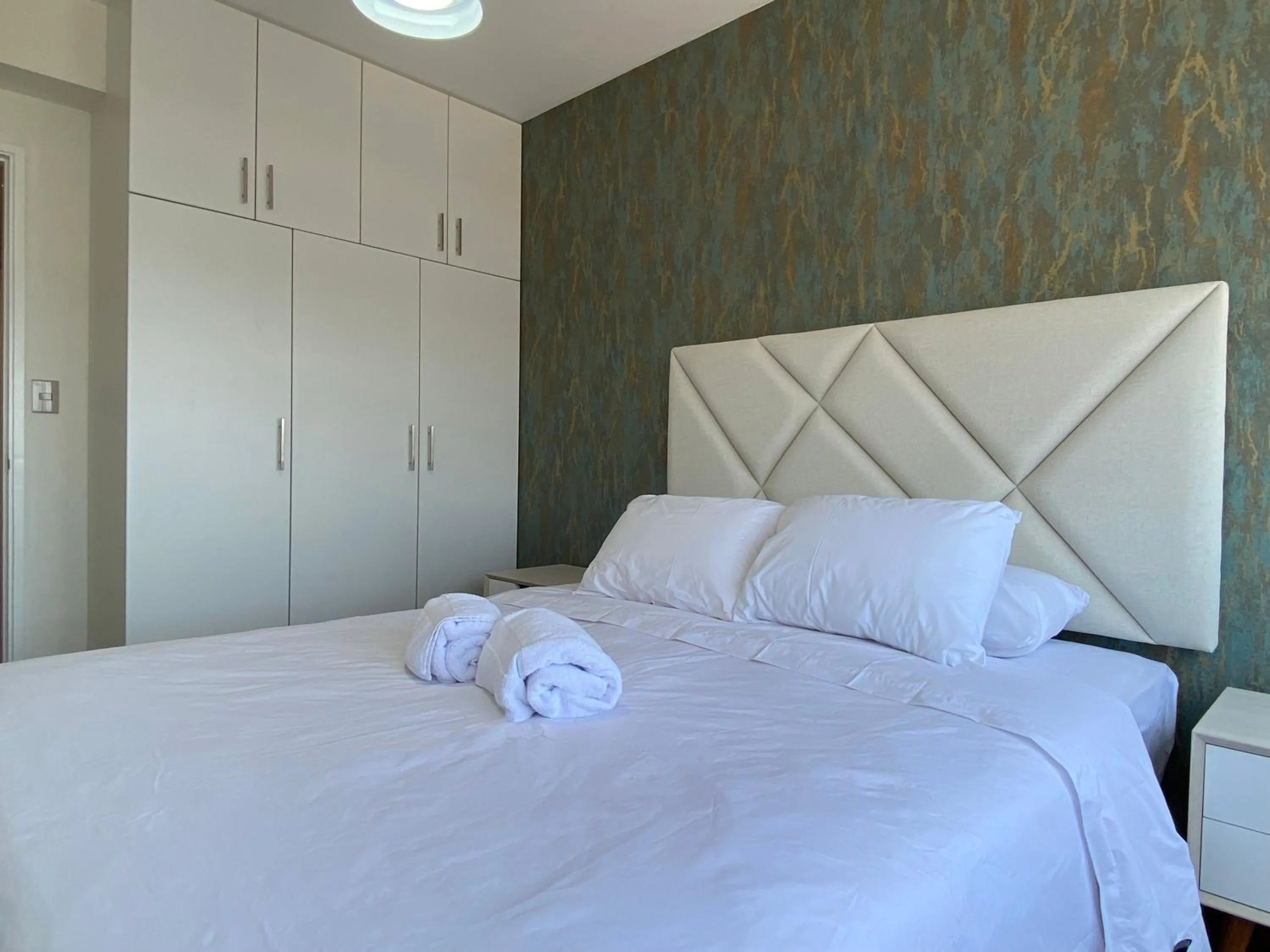 Photo of the whole room, Bed in Borgoño By Wynwood House