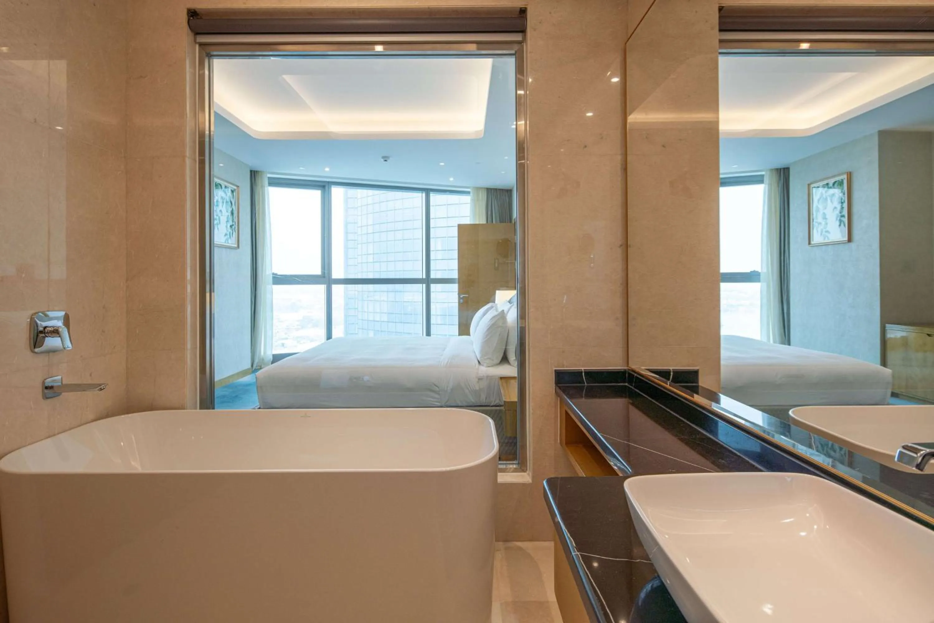 Bathroom, Bed in Hilton Brazzaville Les Tours Jumelles Hotel & Residences