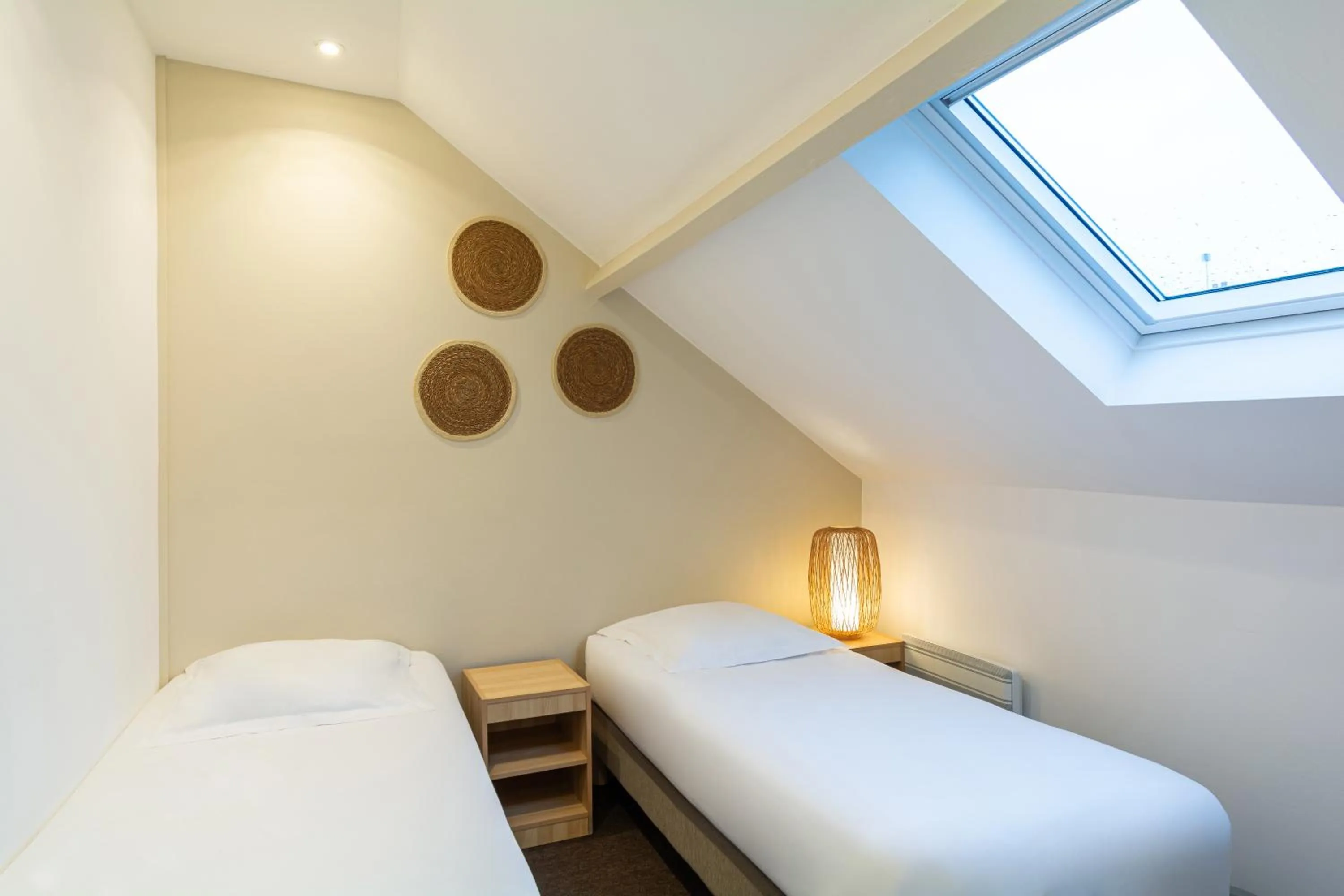 Bed in Hôtel De La Plage