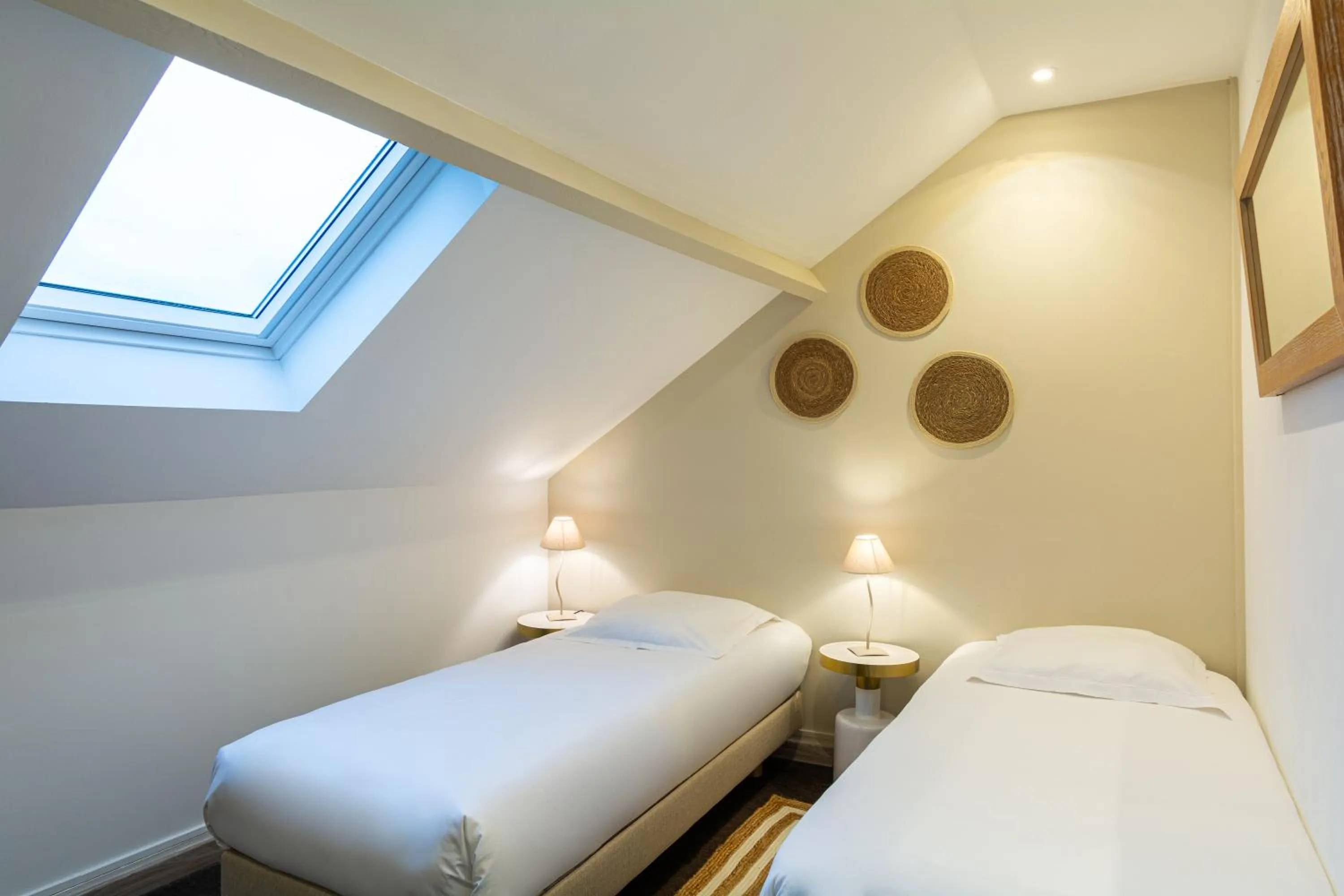 Bed in Hôtel De La Plage