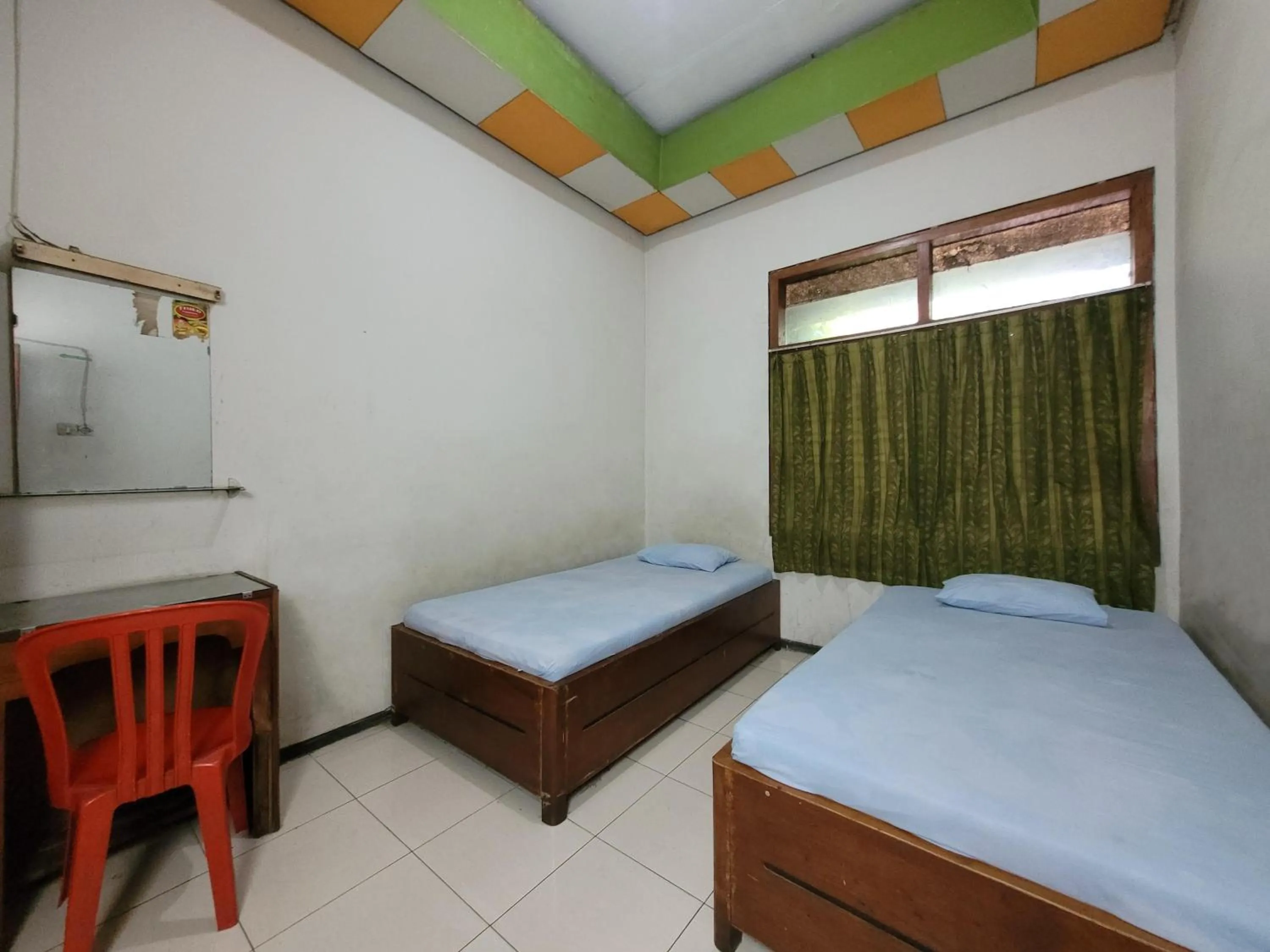 Bed in Hotel Dirgahayu Ponorogo