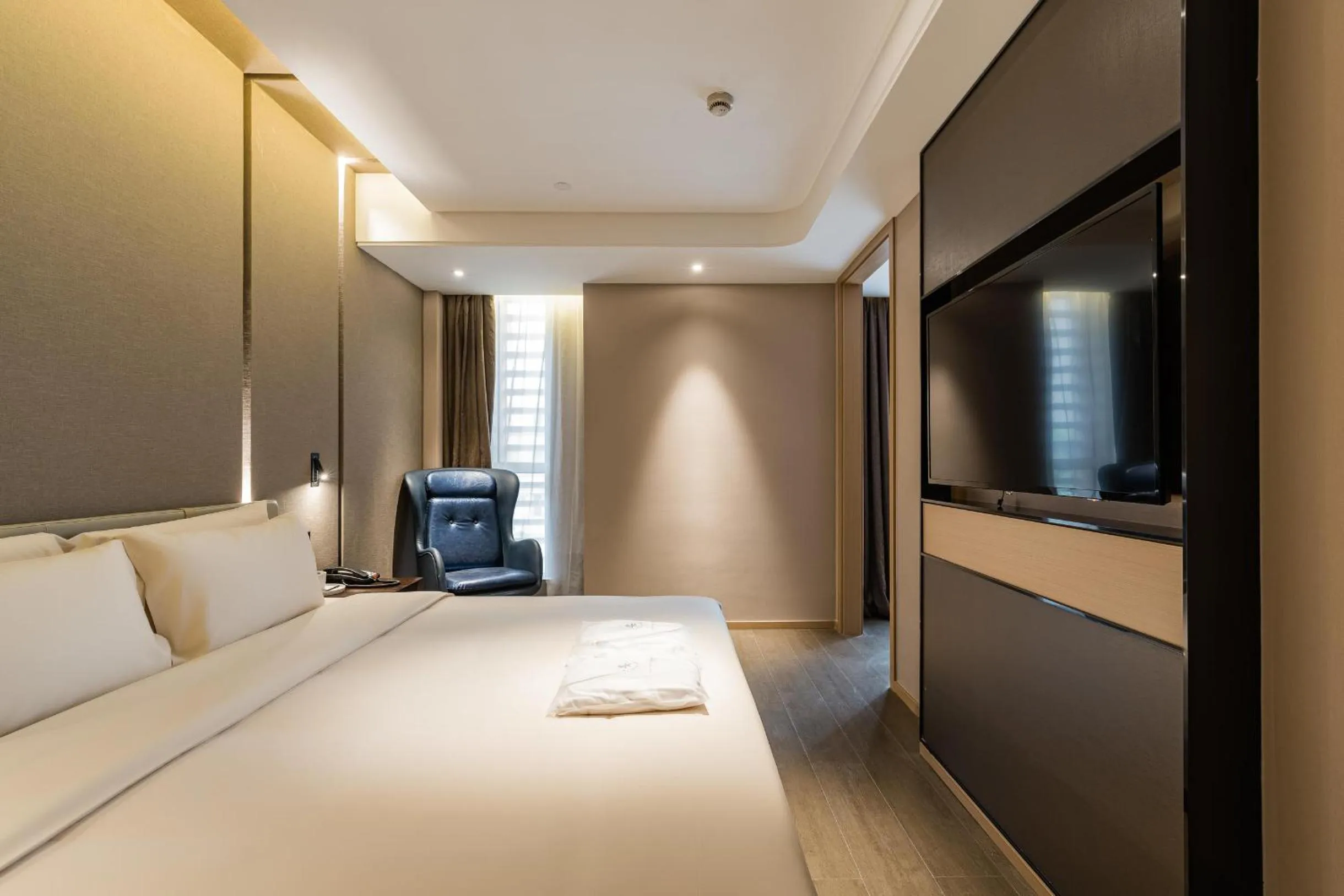 Bed in Atour Hotel Ningbo Yinzhou Wanda Mingzhouli