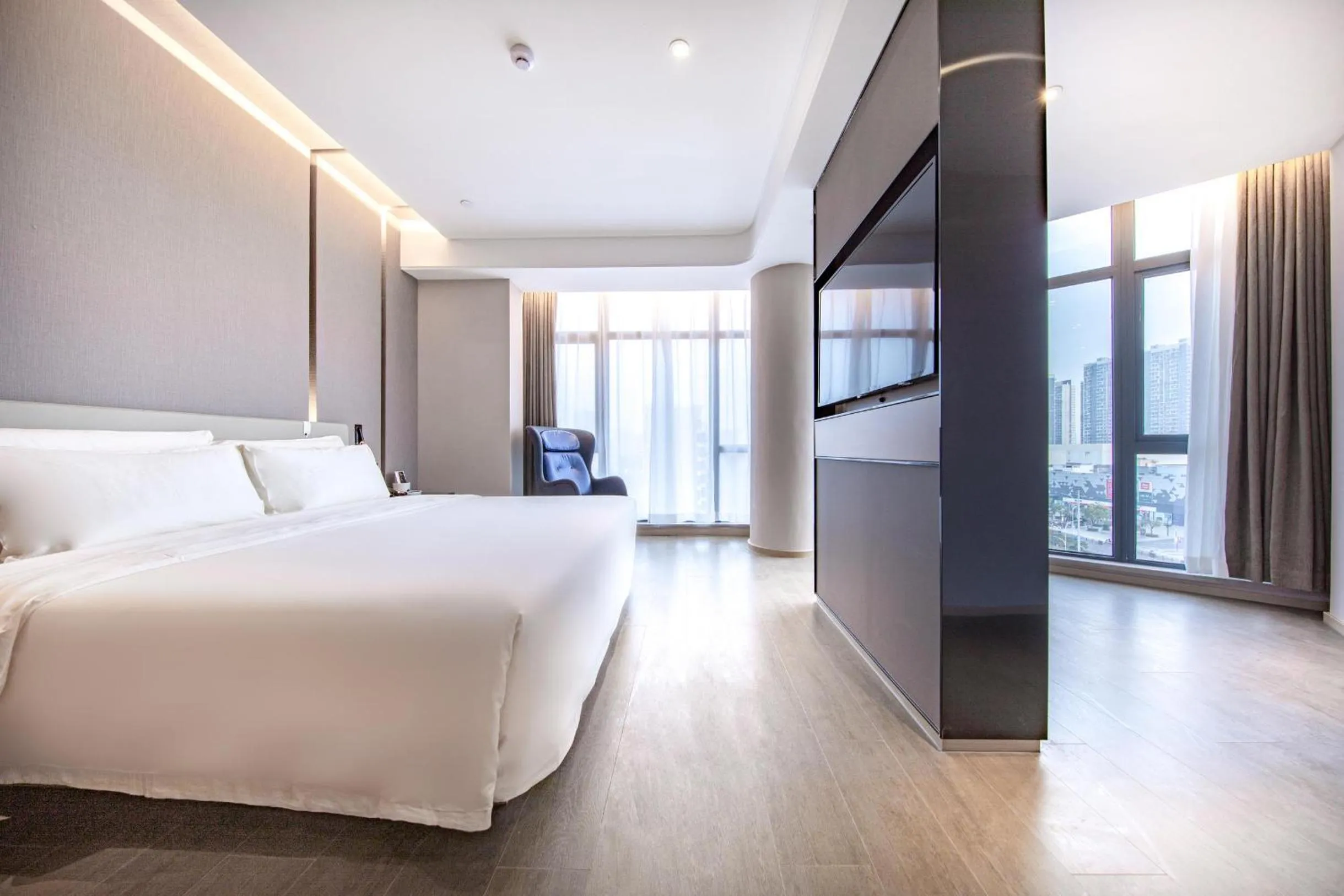 Bed in Atour Hotel Ningbo Yinzhou Wanda Mingzhouli